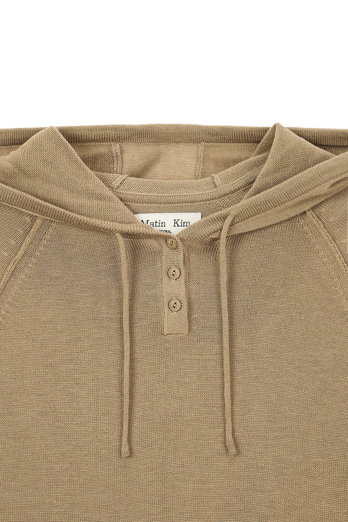 [matinkim] BUTTON HOODY RAGLAN KNIT TOP IN KHAKI