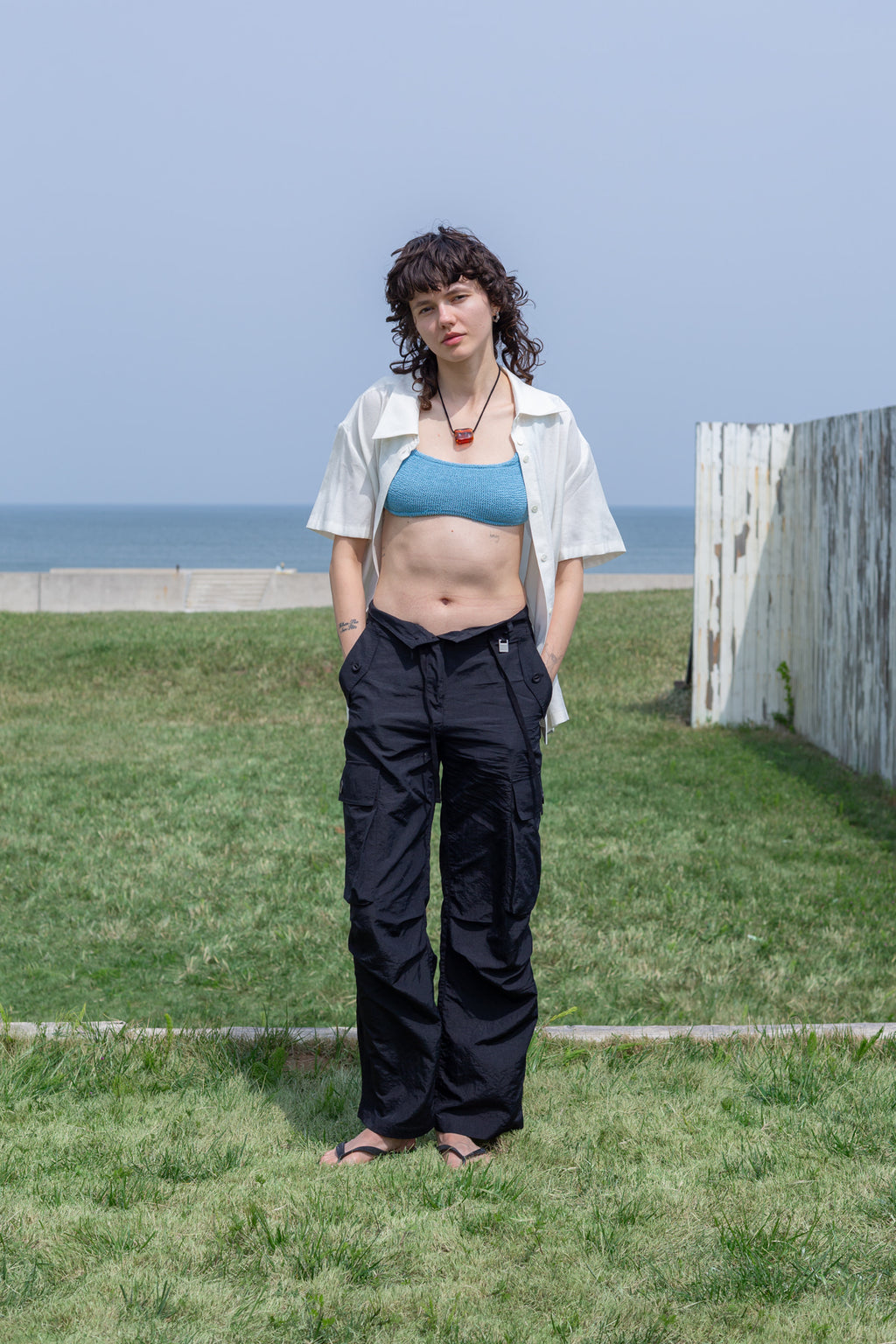 [matinkim] STRING NYLON CARGO PANTS IN BLACK