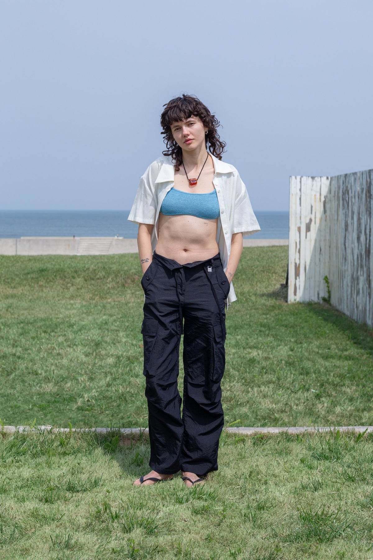 [matinkim] STRING NYLON CARGO PANTS IN BLACK