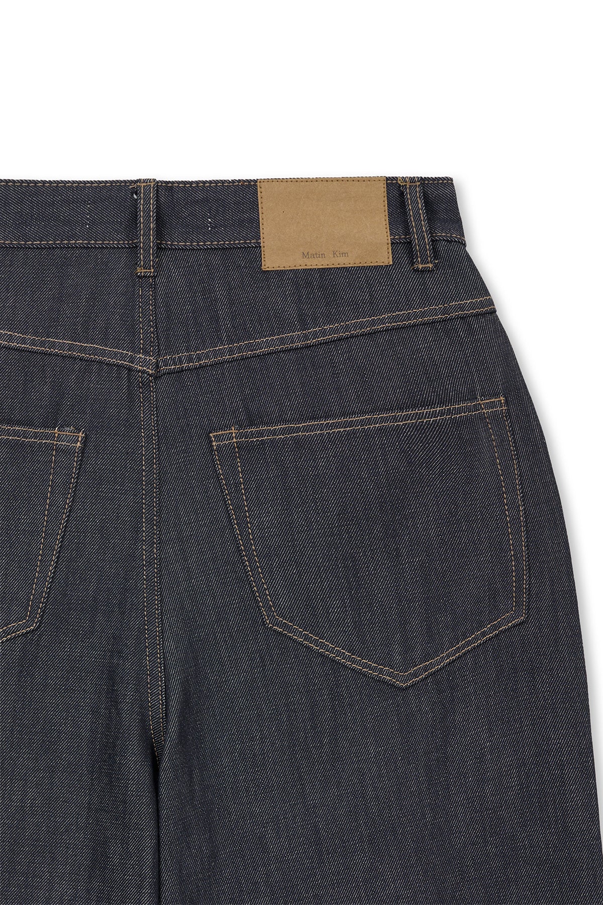 [matinkim] DART POINT DENIM PANTS IN DARK NAVY