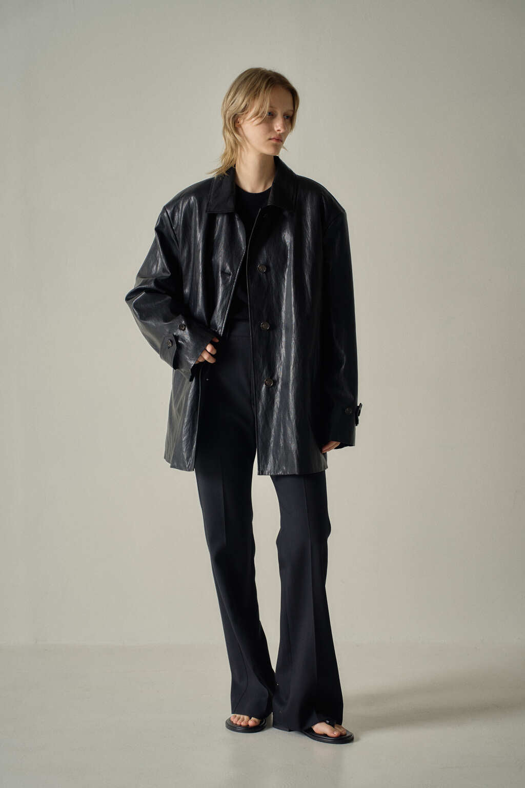 Facade Pattern Leather Half Coat black
