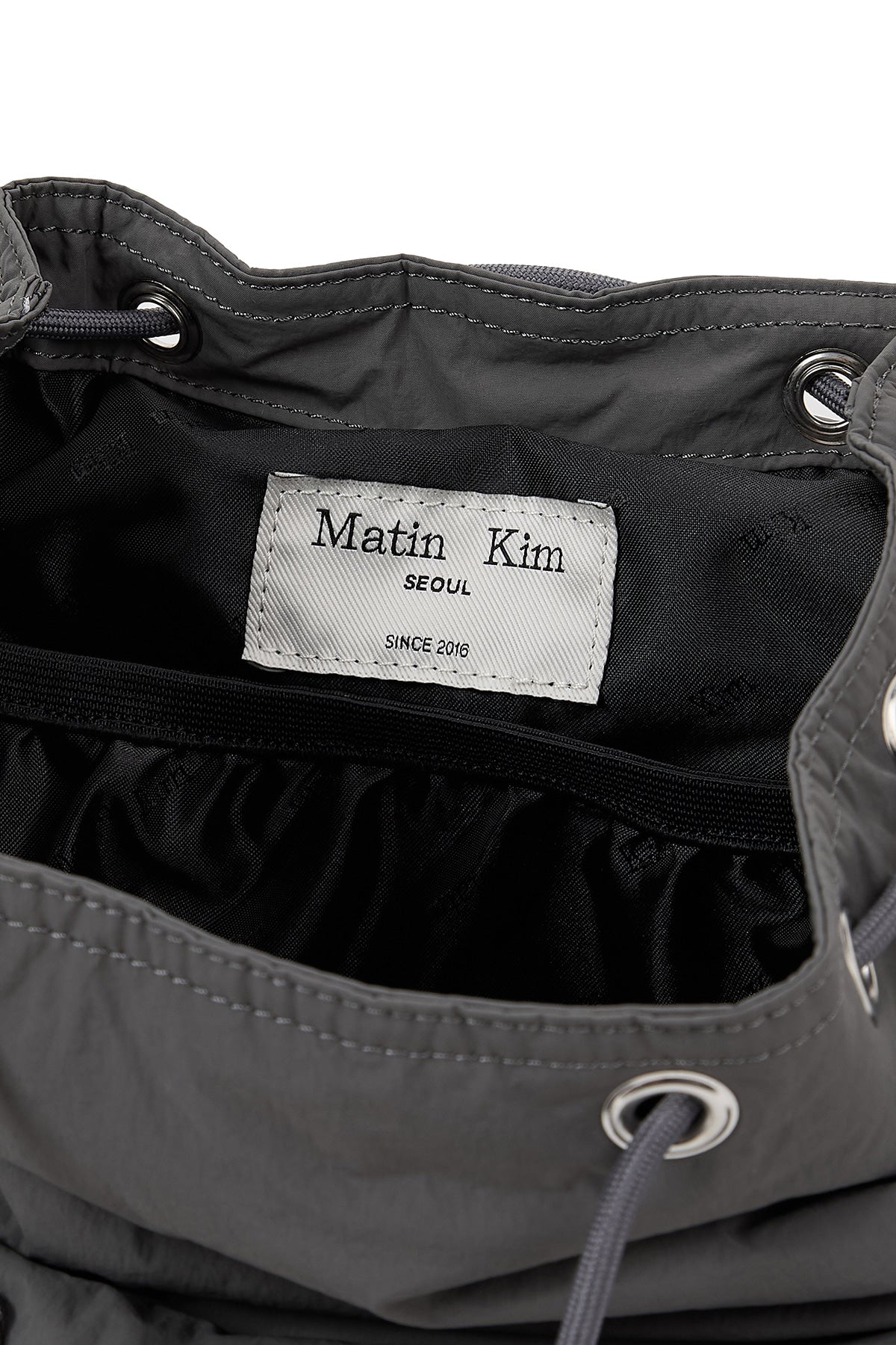 [matinkim] POCKET UTILITY SMALL BACK PACK IN CHARCOAL