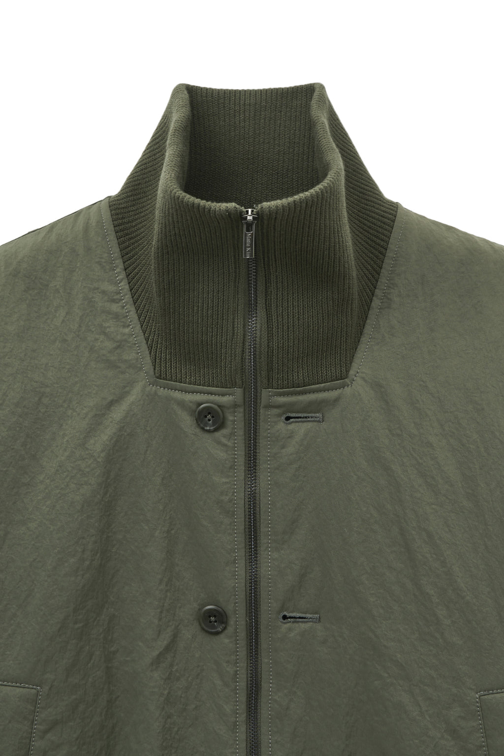 [matinkim] HIGH NECK BUTTON POINT ZIP UP JUMPER IN KHAKI
