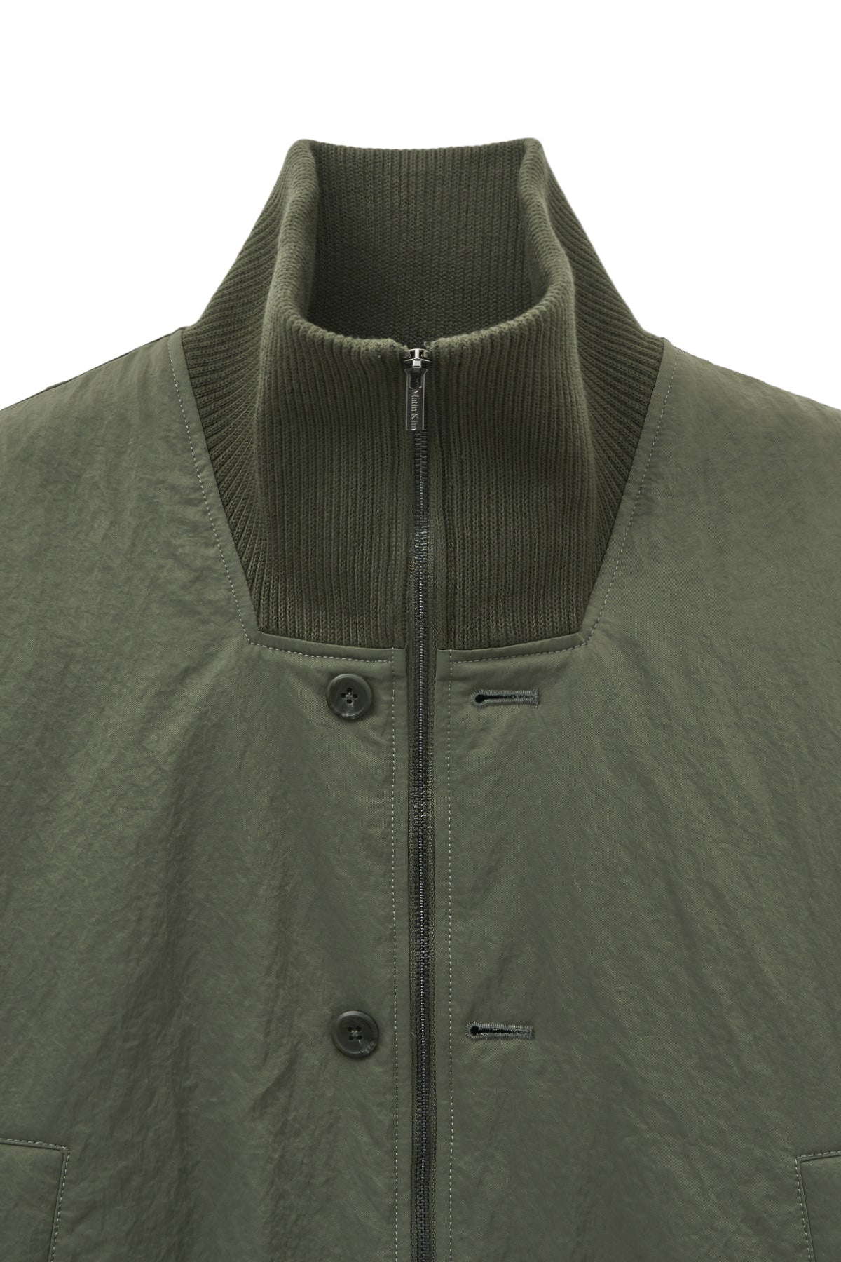 [matinkim] HIGH NECK BUTTON POINT ZIP UP JUMPER IN KHAKI