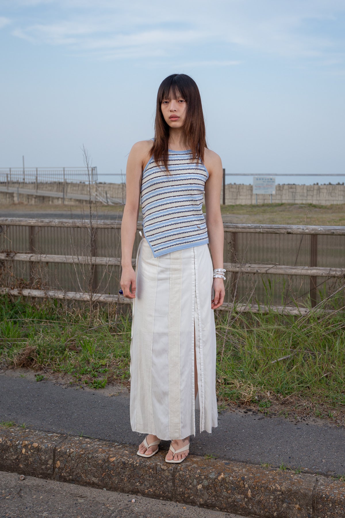 [matinkim] HOOK AND EYE STRING LONG SKIRT IN IVORY