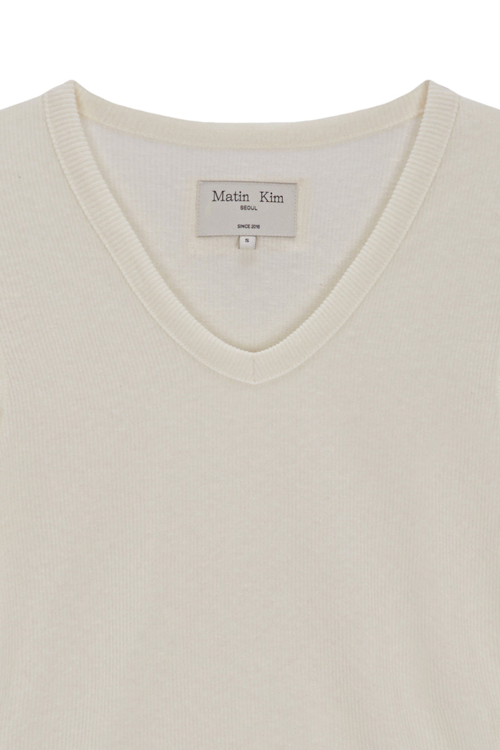 [matinkim] STITCH V NECK SLIM LONG SLEEVE IN IVORY