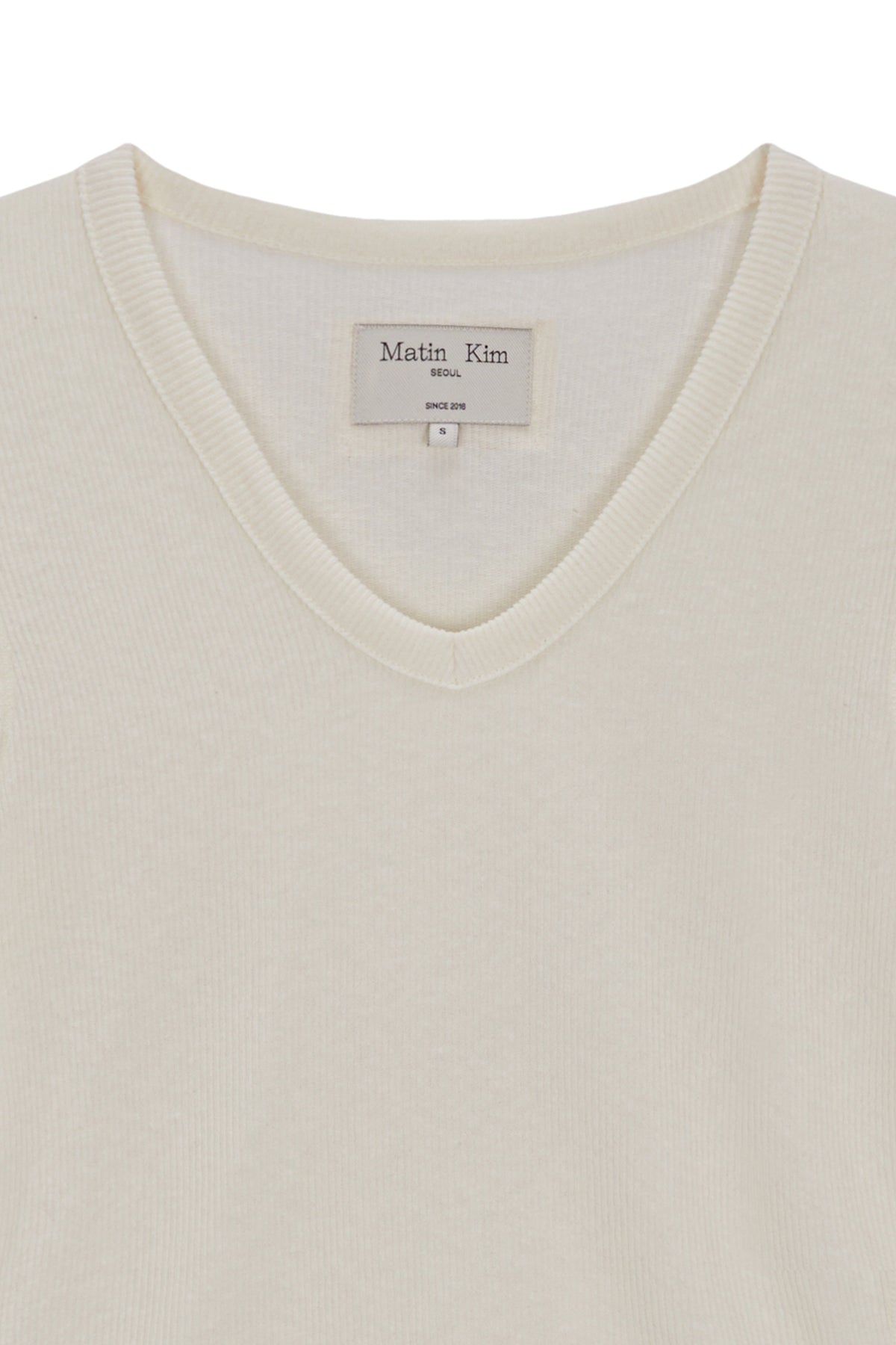 [matinkim] STITCH V NECK SLIM LONG SLEEVE IN IVORY