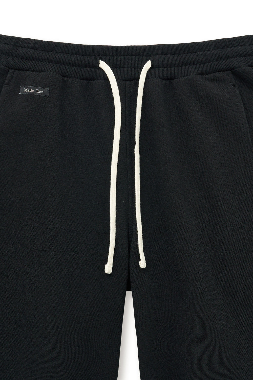 [matinkim] BOOTS CUT SLIM CARGO SWEATPANTS IN BLACK