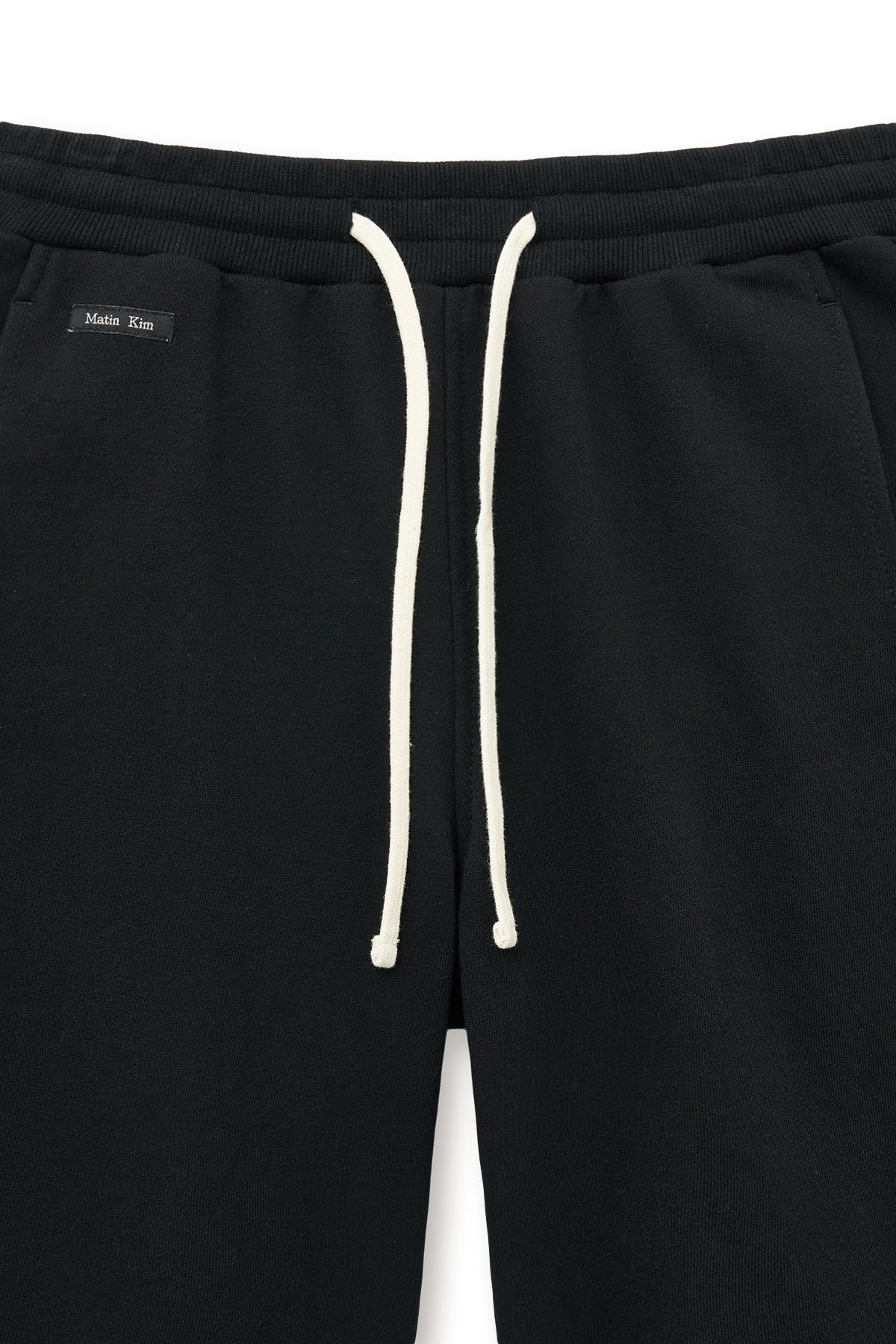 [matinkim] BOOTS CUT SLIM CARGO SWEATPANTS IN BLACK