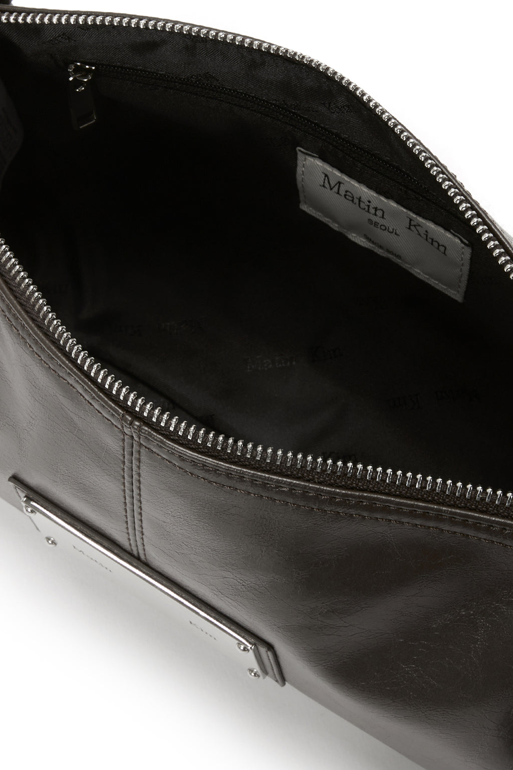 [matinkim] BUCKLE STRAP SHOULDER BAG IN BROWN