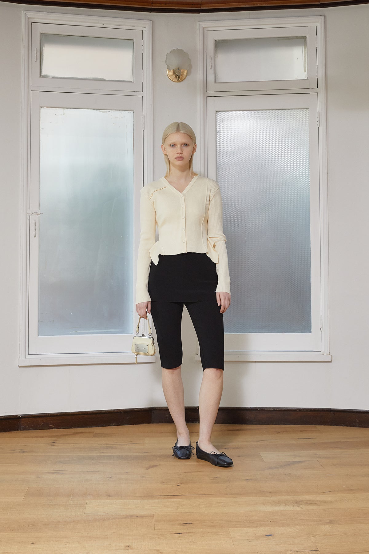 [matinkim] UNBALANCE CUT LINE BUTTON CARDIGAN IN BUTTER