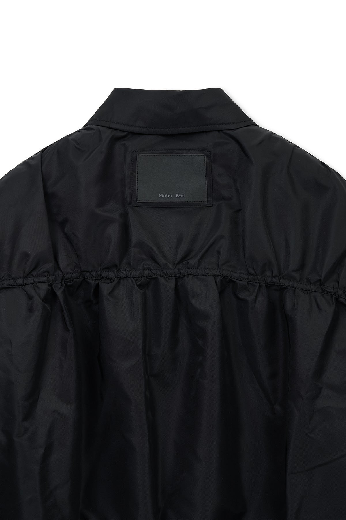 [matinkim] SMALL LOGO SHIRRING JUMPER IN BLACK