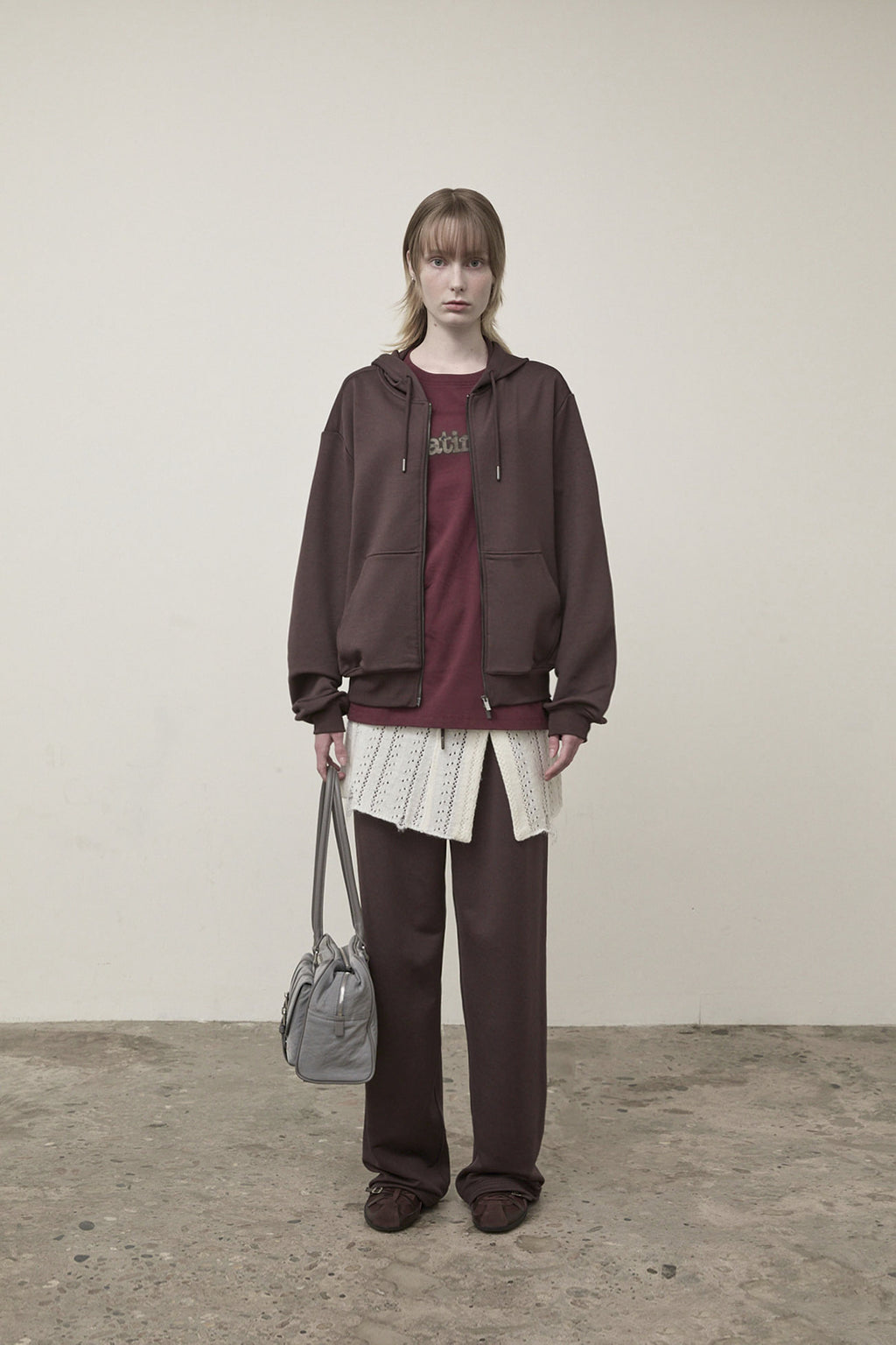 [matinkim] BACK LOGO GLITTER HOODY ZIP UP FOR WOMEN IN BROWN