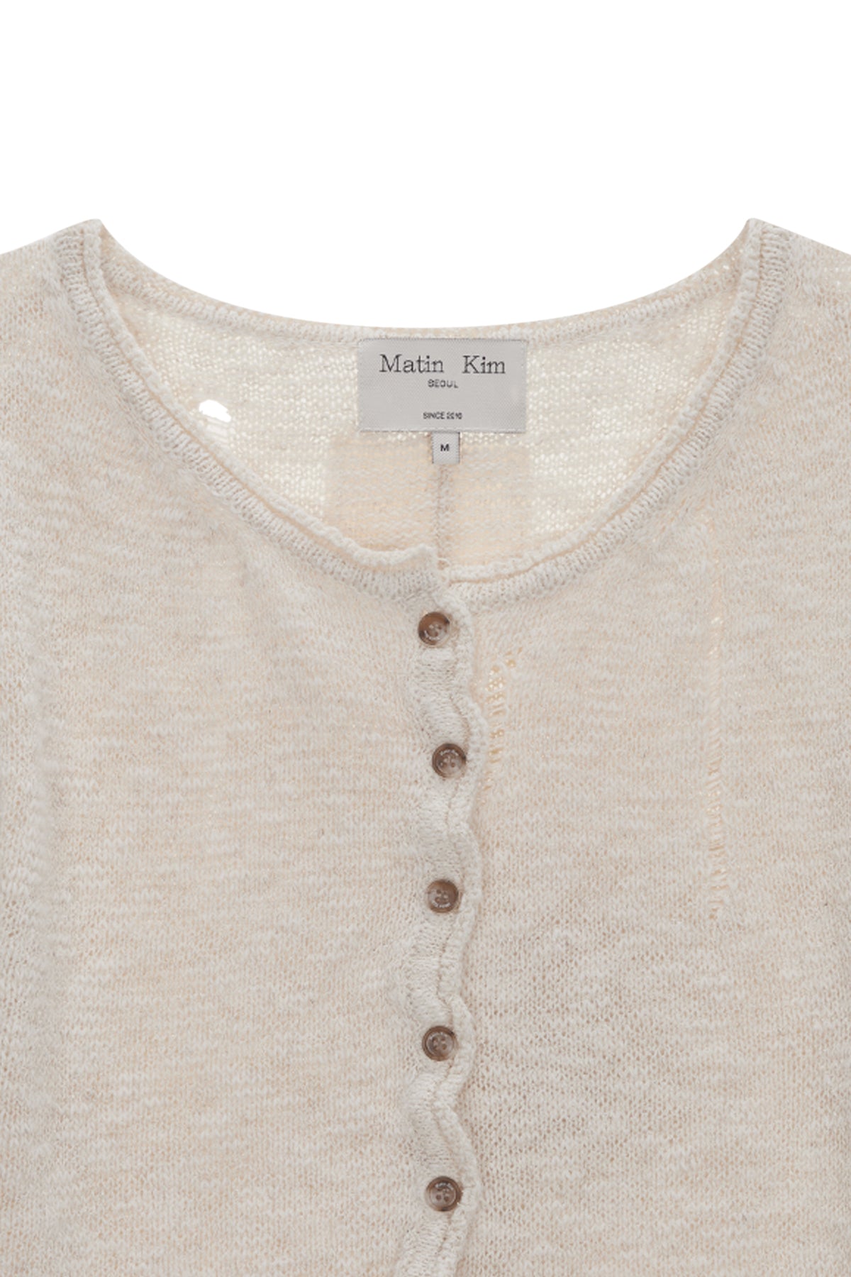 [matinkim] UNBALANCE BUTTON DETAIL CARDIGAN IN IVORY