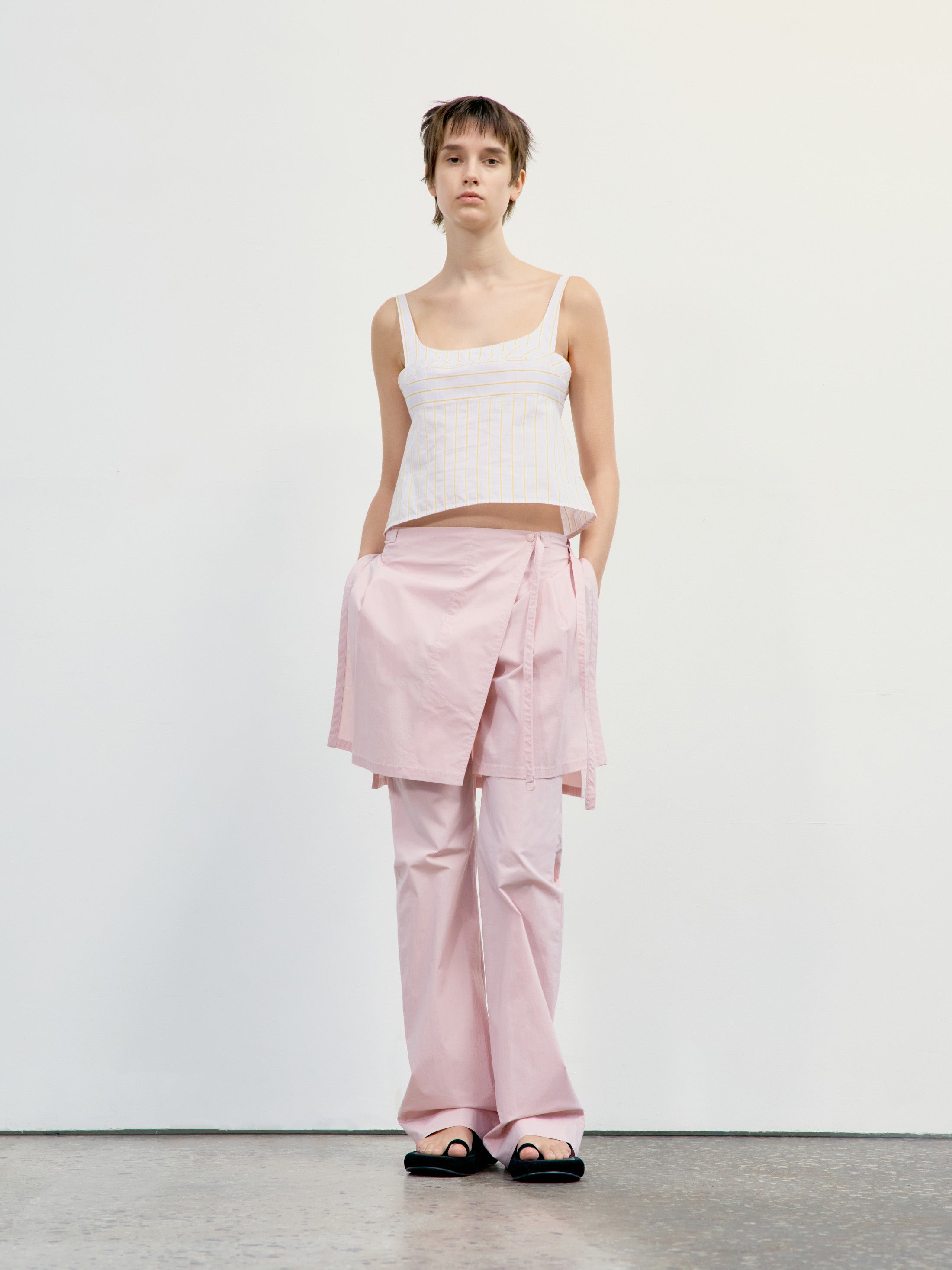 Low Classic Layered Wrap Skirt Pants in Light Pink, showcasing modern Korean designer fashion.