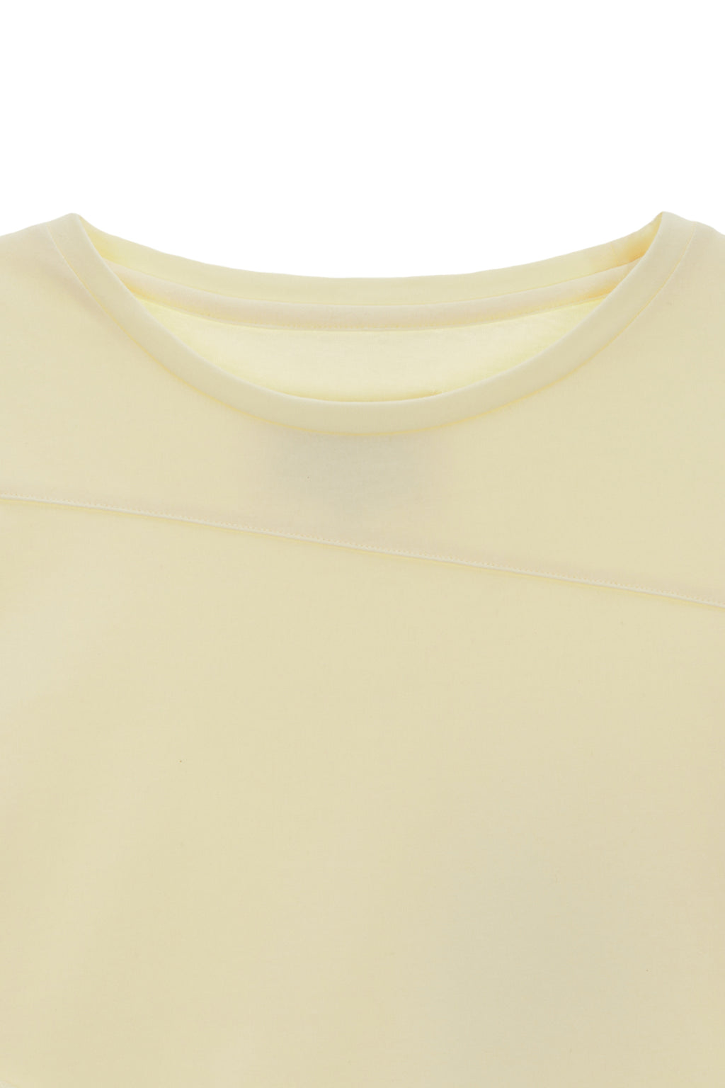 [matinkim] DIAGONAL SLIMFIT LONG SLEEVE TOP IN LIGHT YELLOW