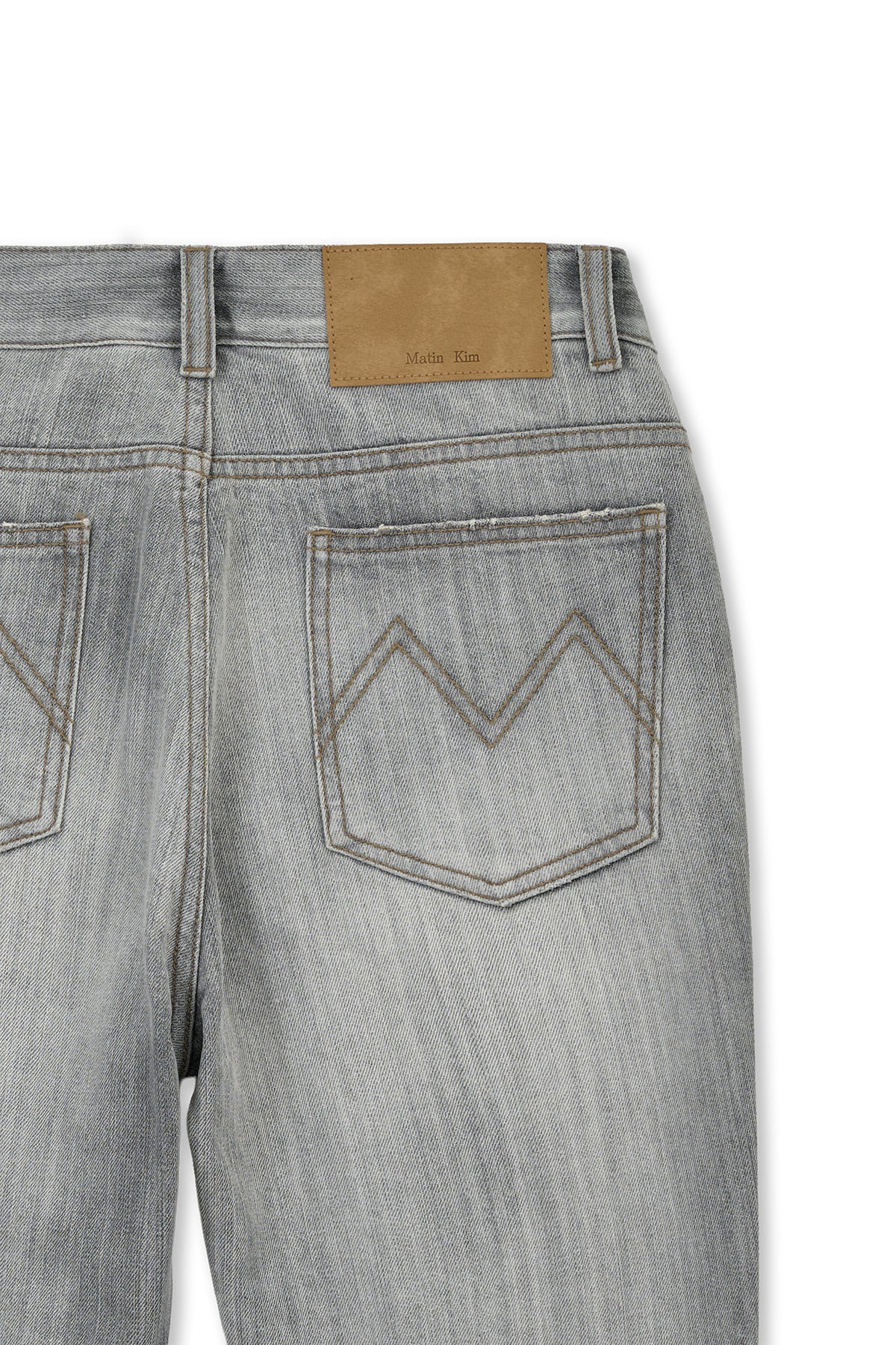 [matinkim] WASHED POINT BOOTS CUT DENIM PANTS IN GREY