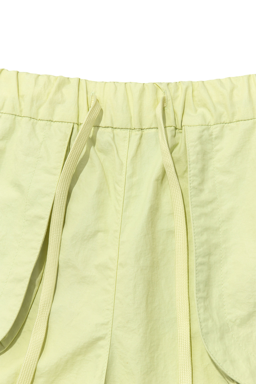 [matinkim] OUT POCKET NYLON BANDING SHORTS IN LIME