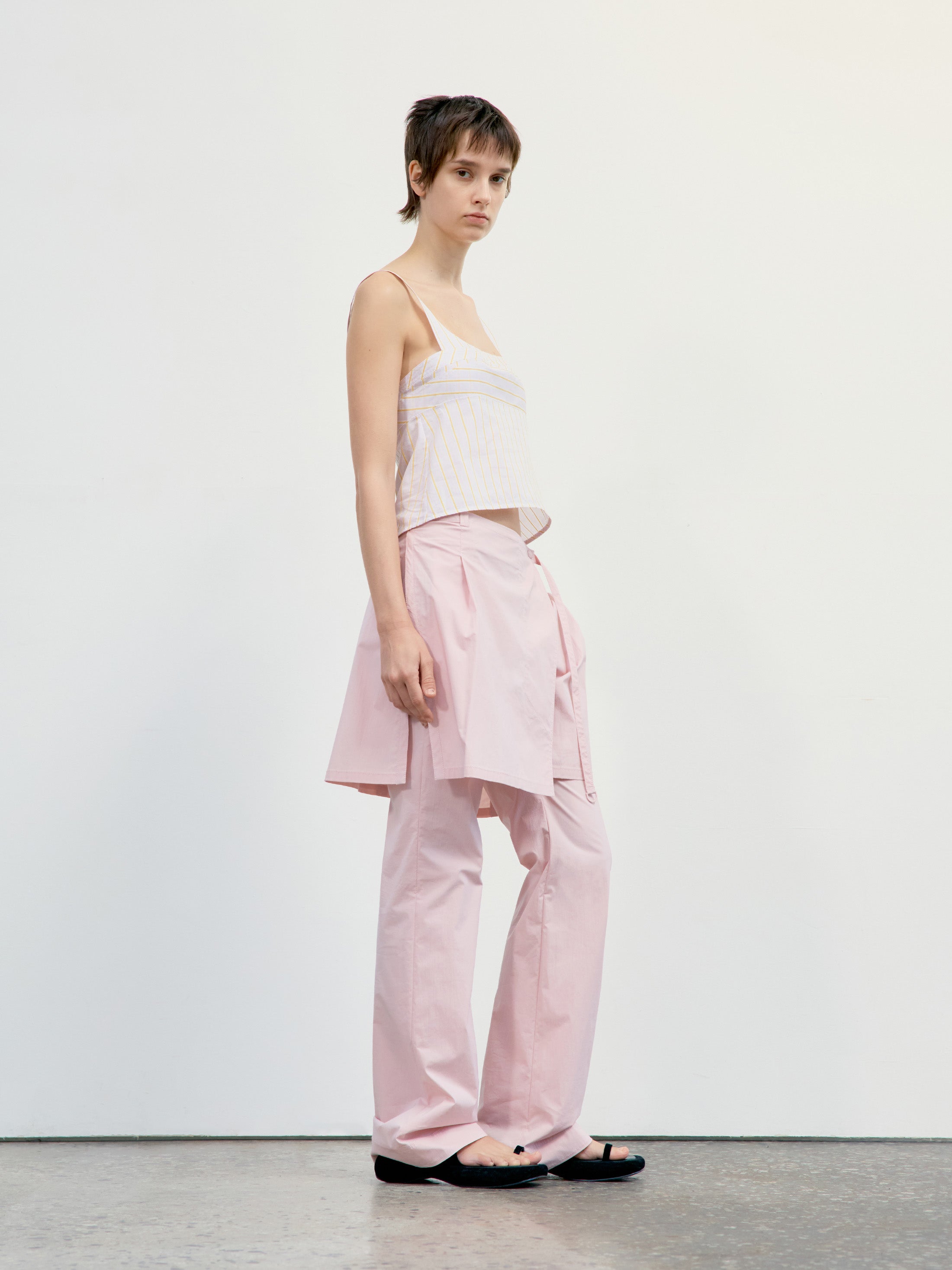 Low Classic Layered Wrap Skirt Pants in Light Pink, showcasing modern Korean designer fashion.