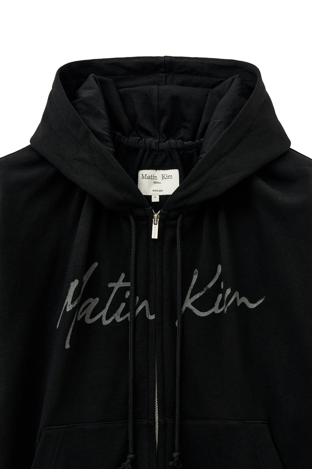 [matinkim] DRAWSTRING POINT ZIP UP HOODY IN BLACK