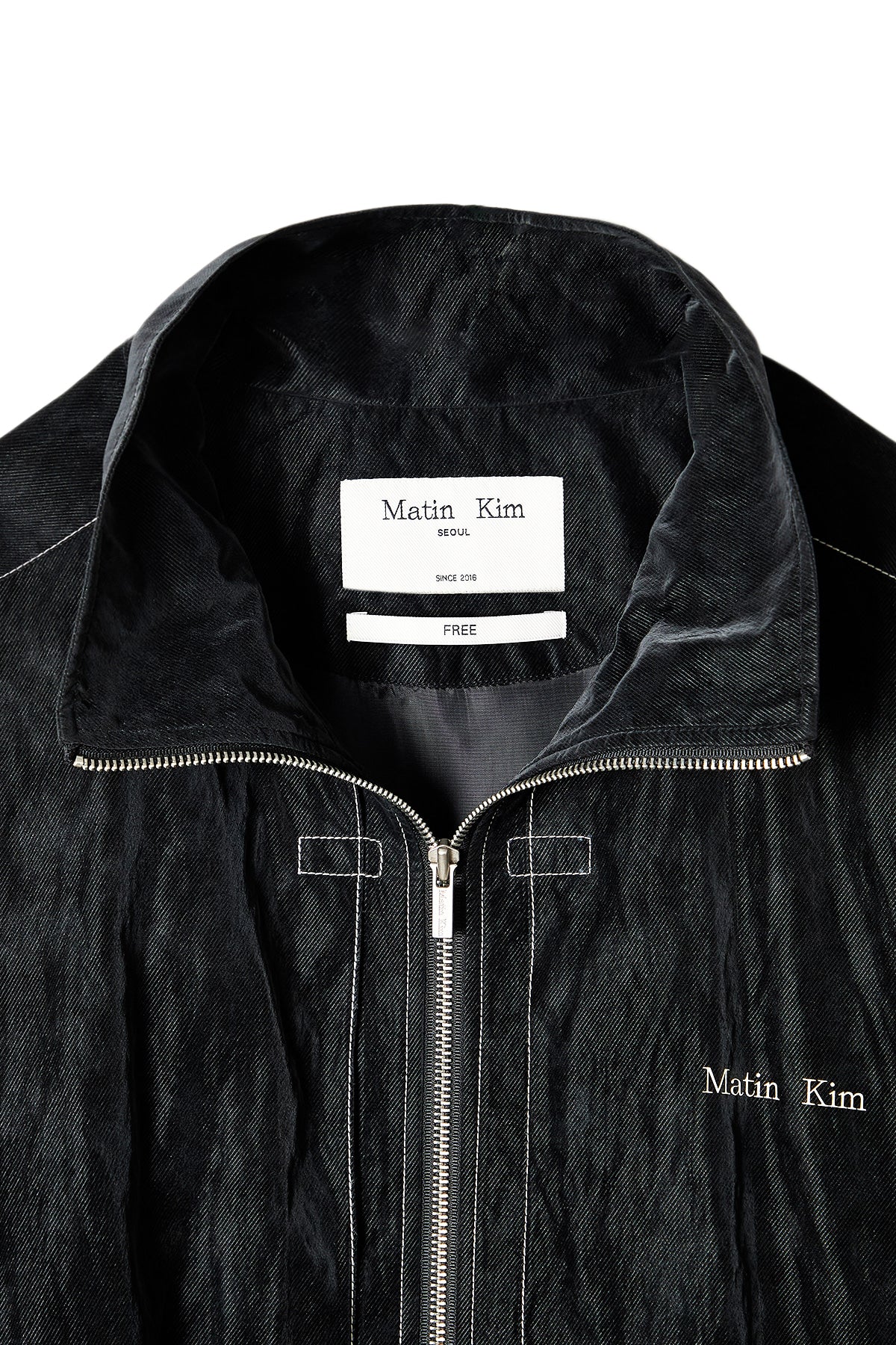 [matinkim] STITCH POINT HIGH NECK JUMPER IN BLACK