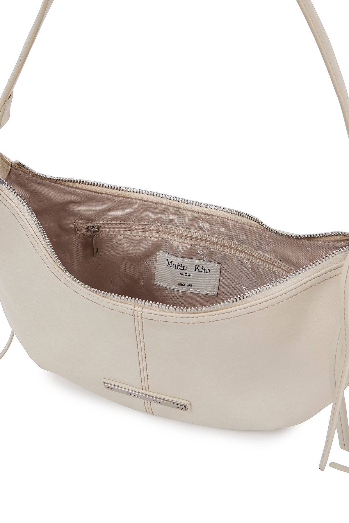 [matinkim] MOONLINE ARC HOBO BAG IN LIGHT BEIGE