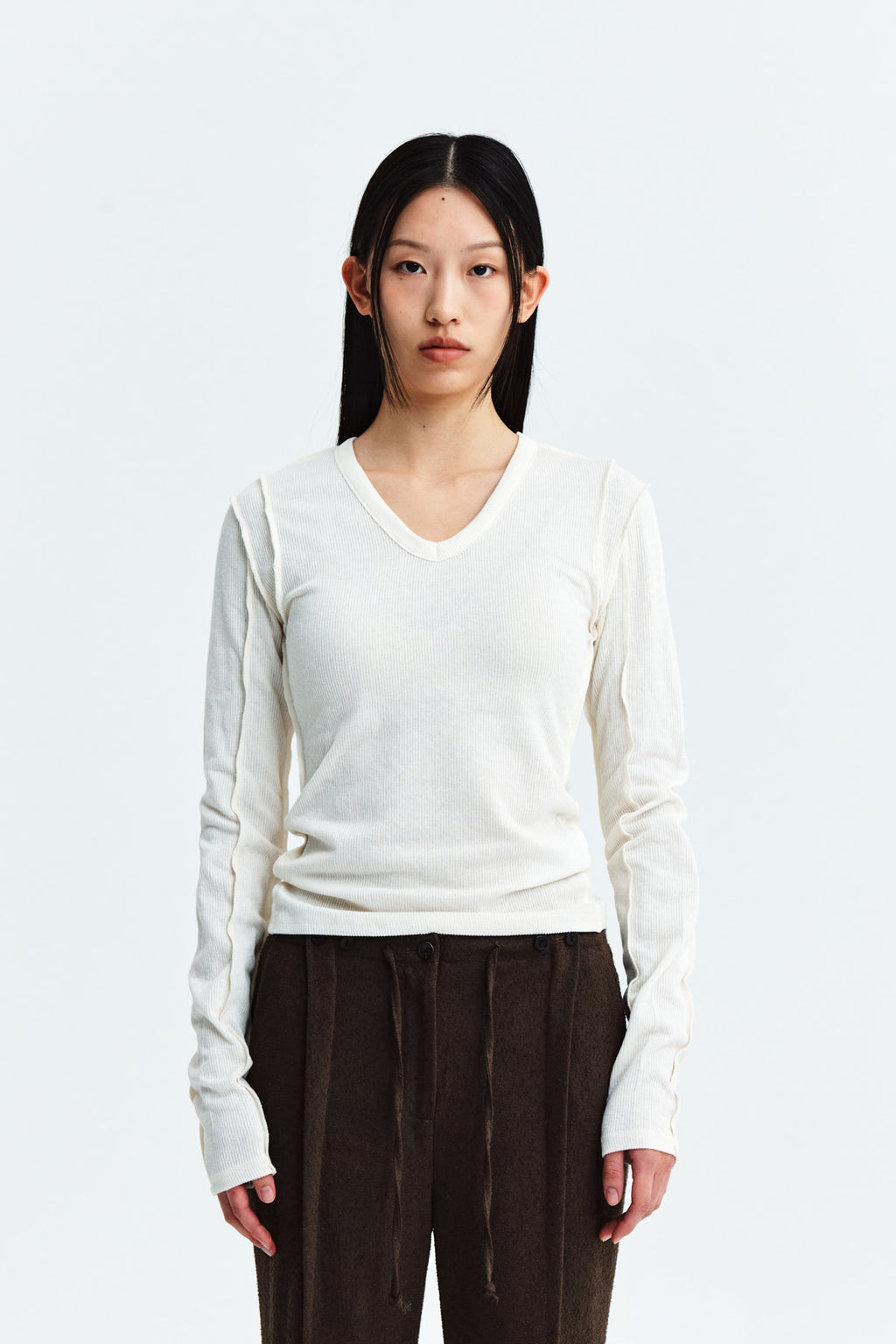 [matinkim] STITCH V NECK SLIM LONG SLEEVE IN IVORY