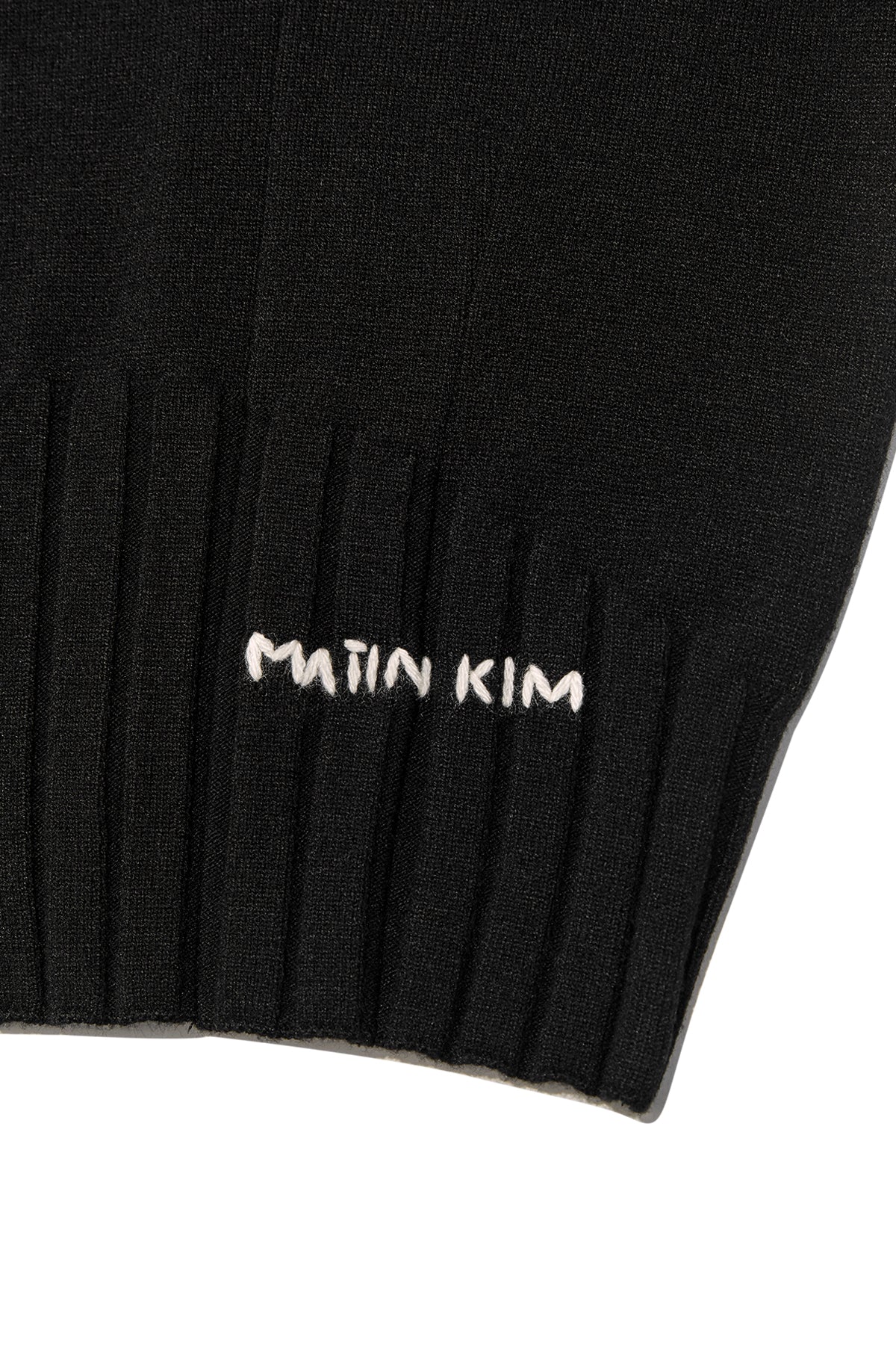 [matinkim] ROUND NECK ZIP UP CROP CARDIGAN IN BLACK