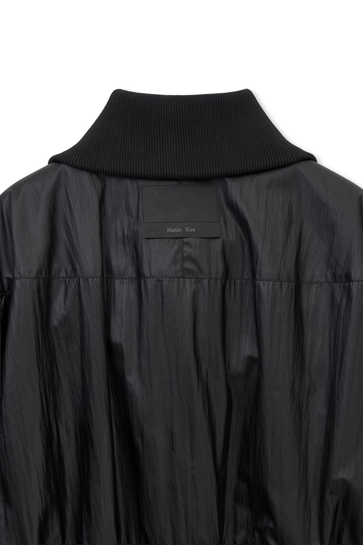 [matinkim] SHINE CRINKLE ZIP BLOUSON IN BLACK