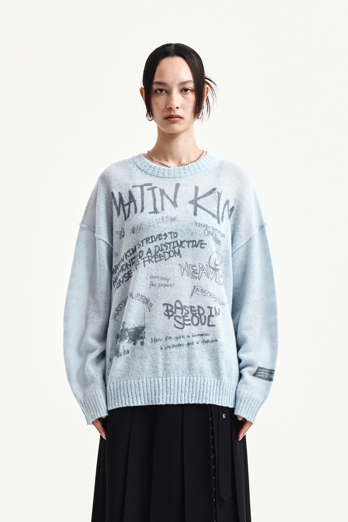 [matinkim] GRAFFITI ARTWORK KNIT PULLOVER IN LIGHT BLUE