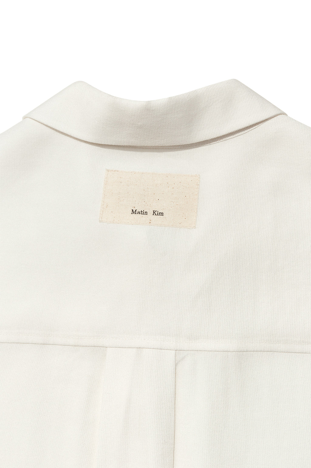 [matinkim] UNBALANCE COLLAR HALF SHIRT IN IVORY
