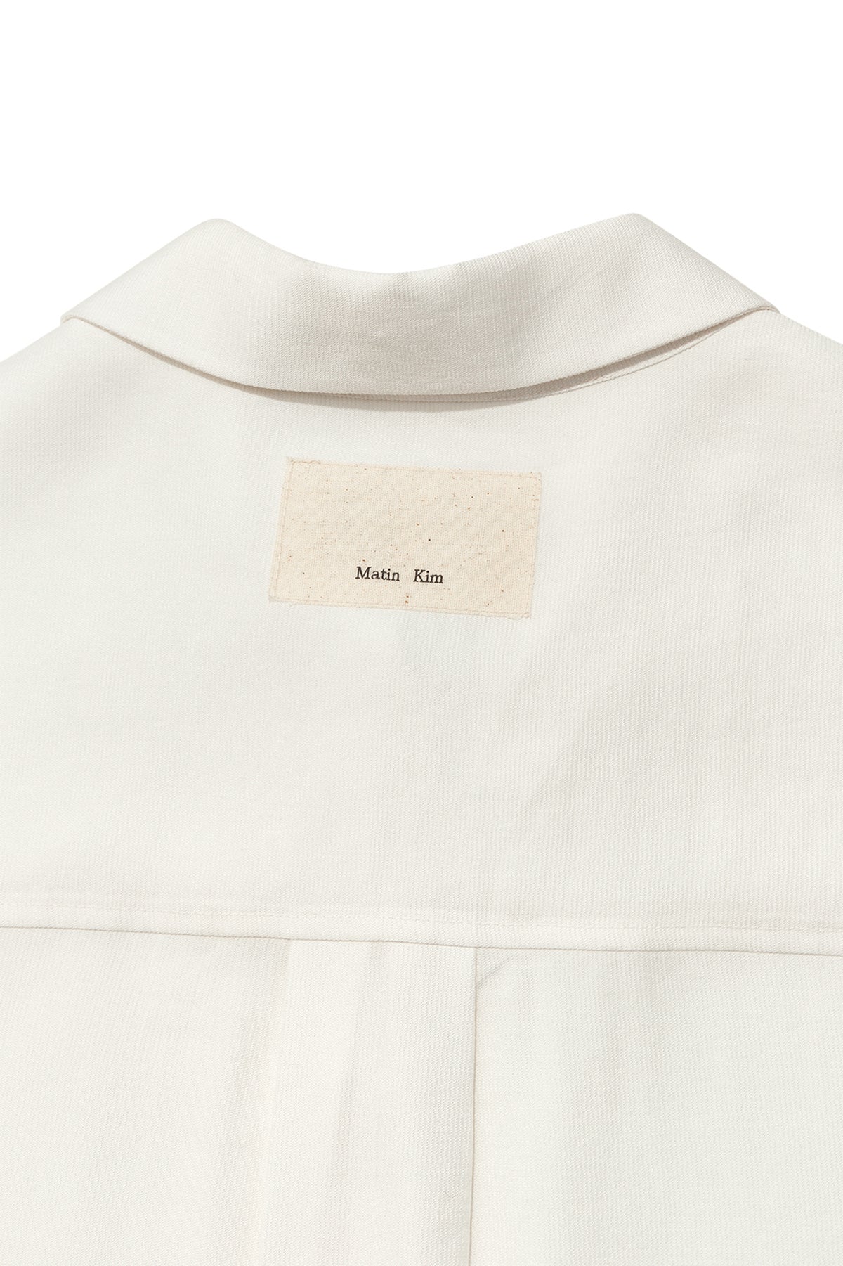 [matinkim] UNBALANCE COLLAR HALF SHIRT IN IVORY