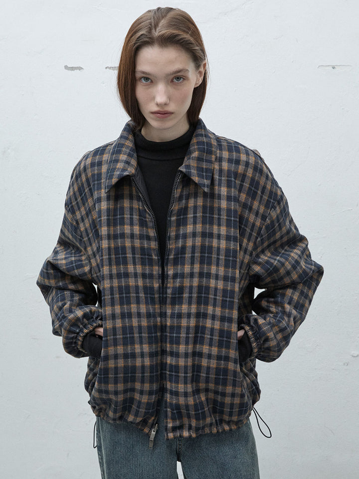 Raive Reversible Padded Jumper in Black Check