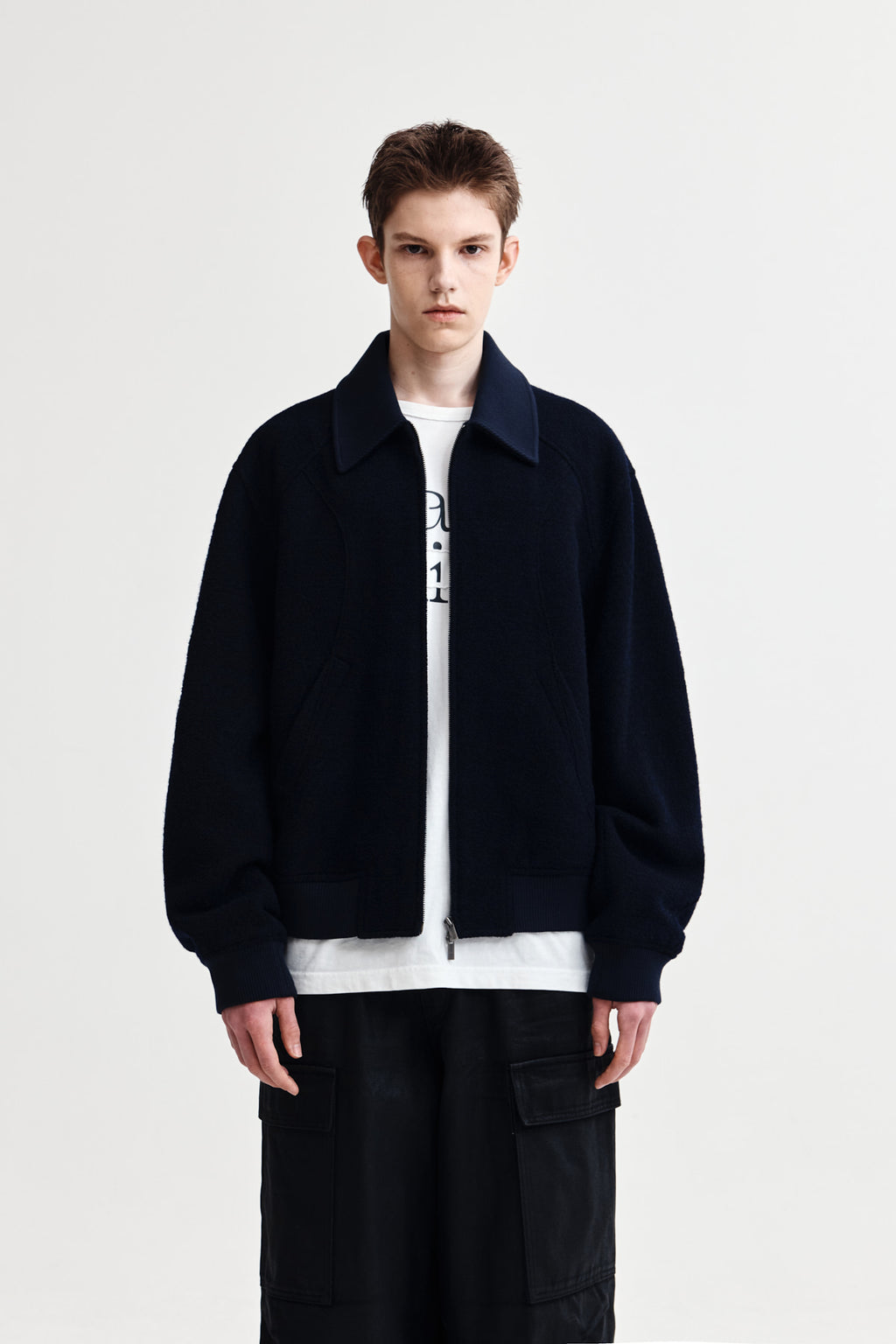 [matinkim] CURVED POINT WOOL JUMPER FOR MEN IN NAVY