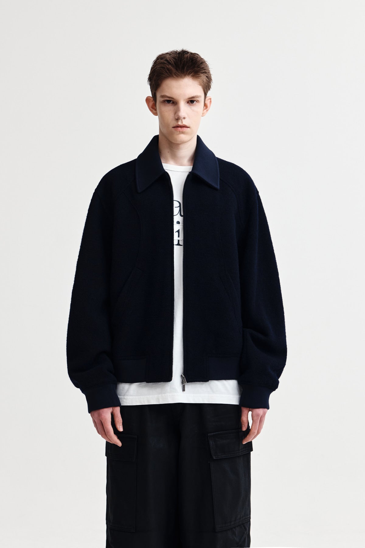 [matinkim] CURVED POINT WOOL JUMPER FOR MEN IN NAVY