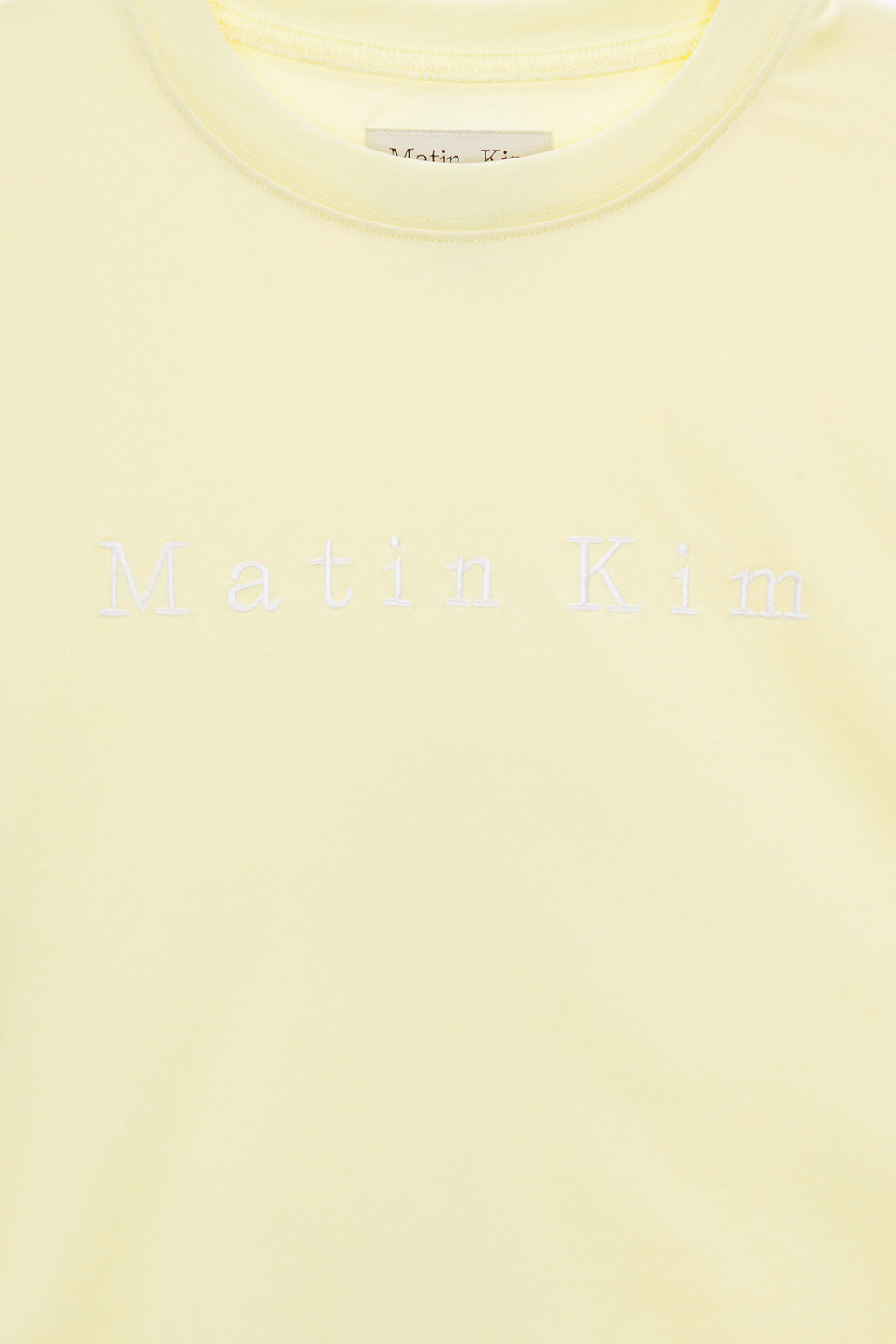 [matinkim] MATIN EMBROIDERY LOGO CROP TOP IN LIGHT YELLOW
