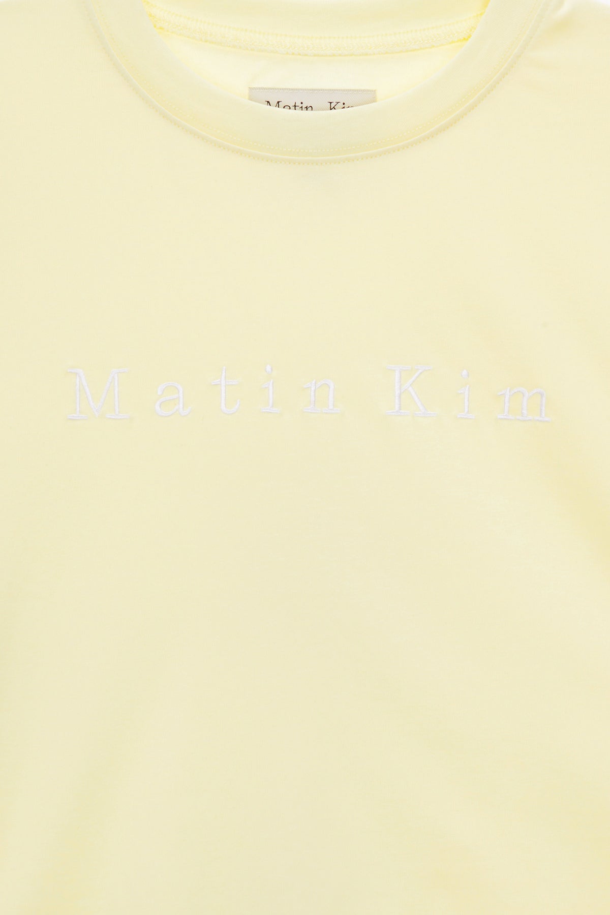 [matinkim] MATIN EMBROIDERY LOGO CROP TOP IN LIGHT YELLOW