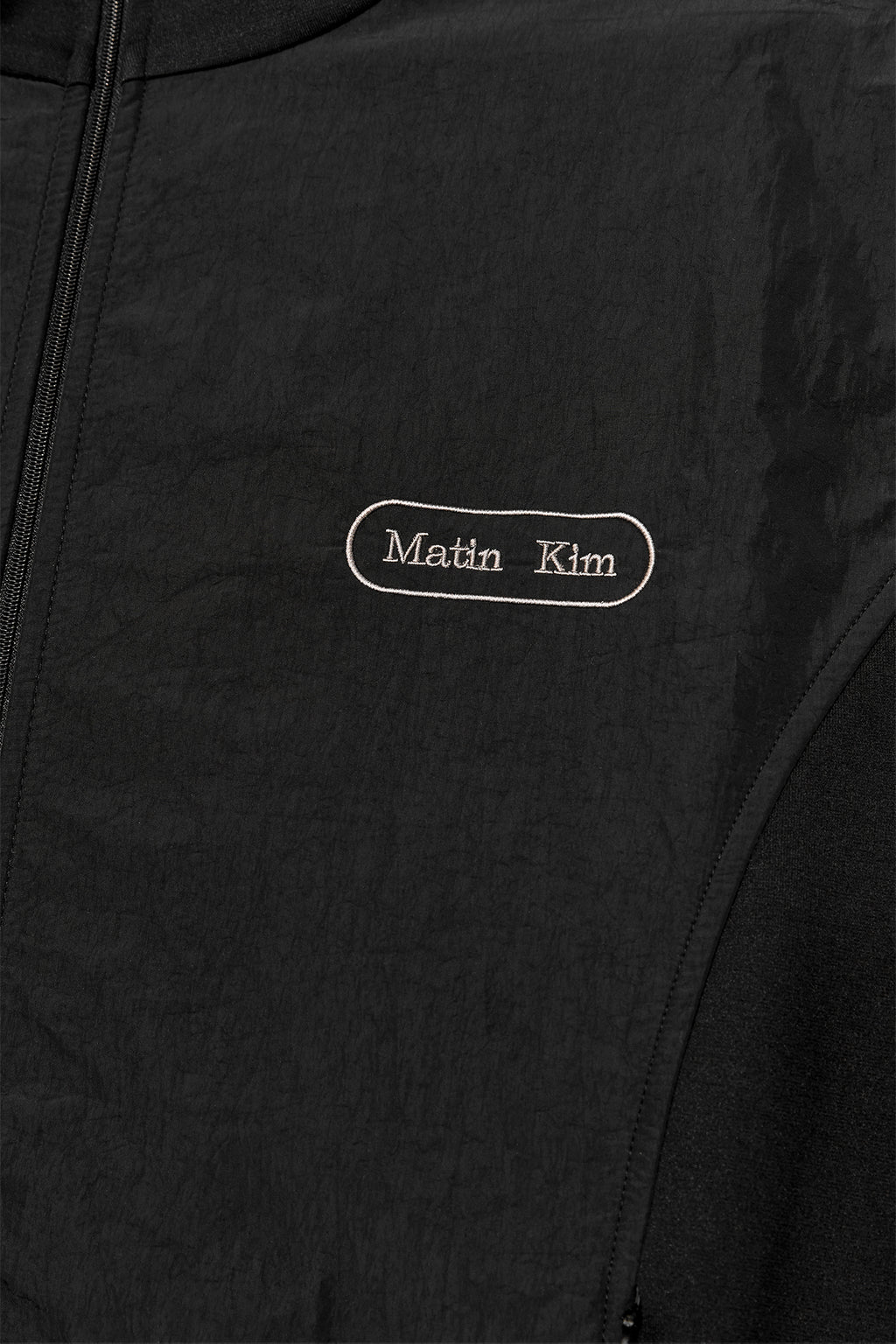 [matinkim] HIGH NECK WINDBREAKER ZIP UP FOR MEN IN BLACK