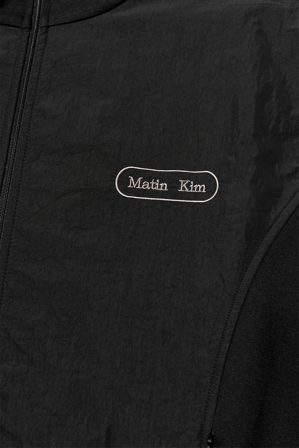 [matinkim] HIGH NECK WINDBREAKER ZIP UP FOR MEN IN BLACK