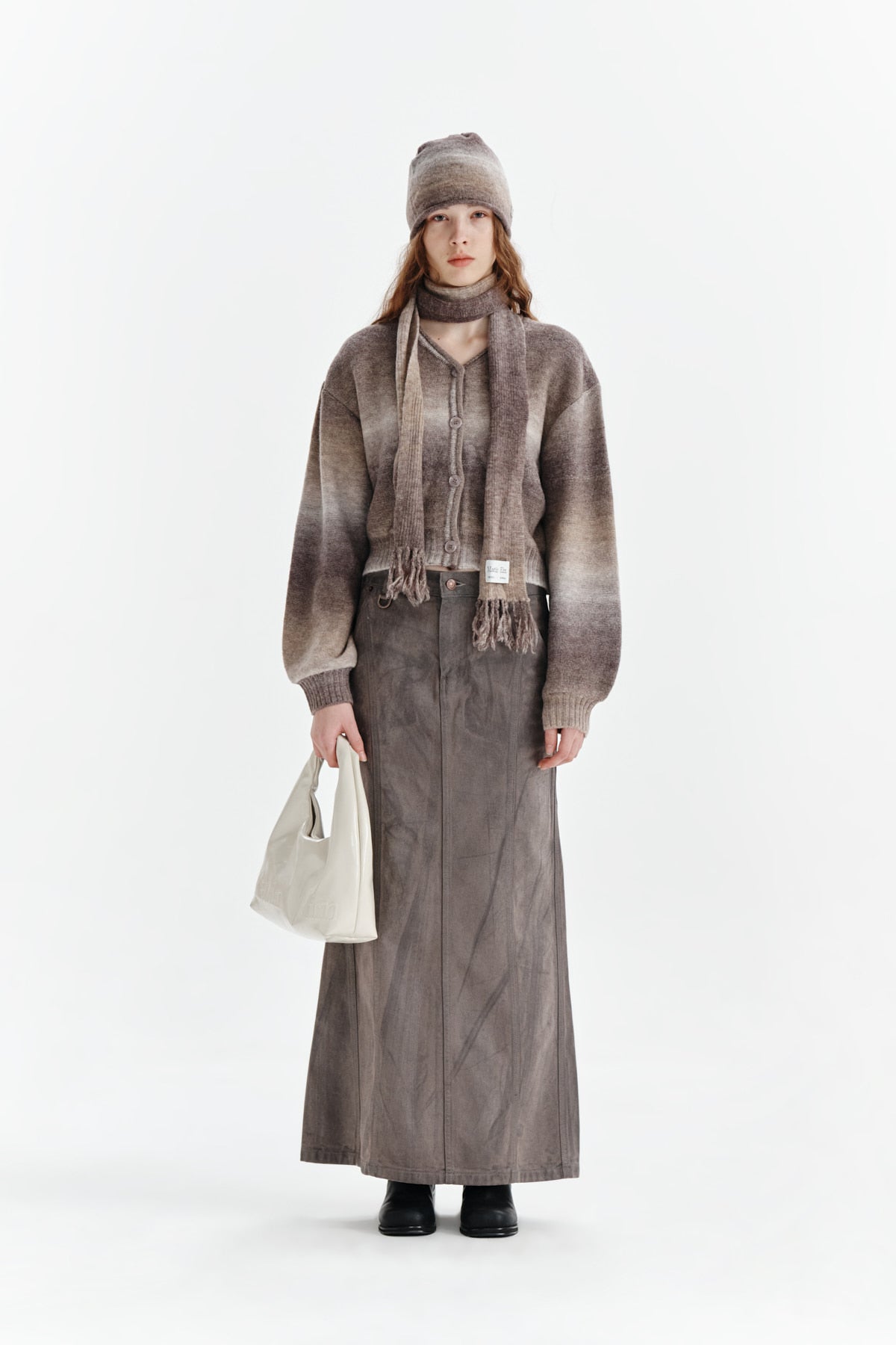 [matinkim] WAX COATING DENIM SKIRT IN BROWN