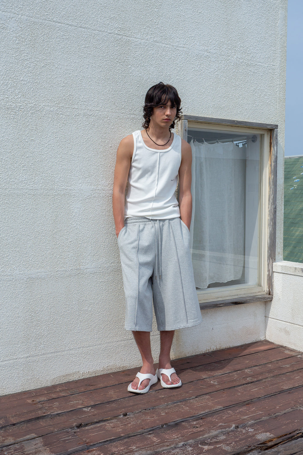 Matinkim Small Logo Pintuck Sleeveless Top For Men IN White