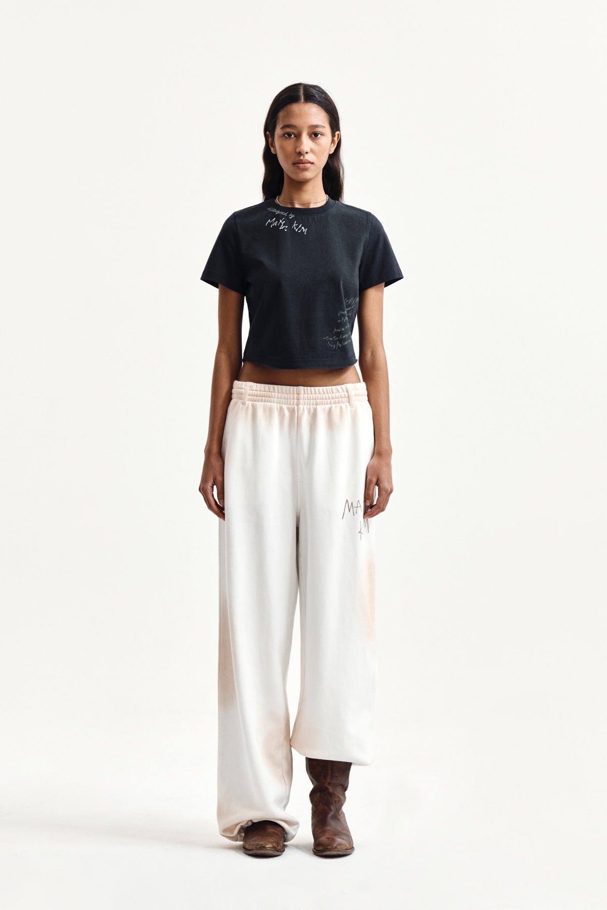 [matinkim] VINTAGE WASHED LOGO SWEATPANTS IN IVORY