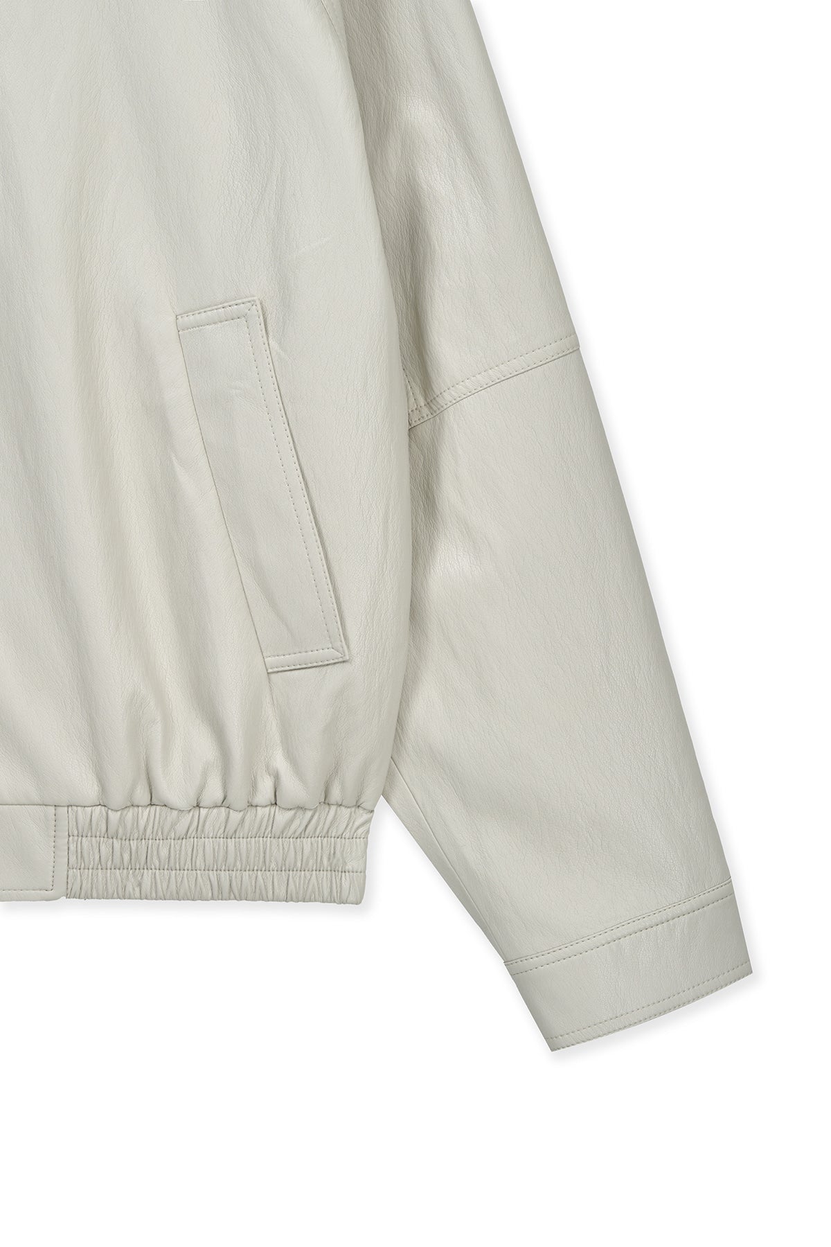 [matinkim] SMALL LOGO FAUX LEATHER ZIP UP JUMPER IN LIGHT GREY