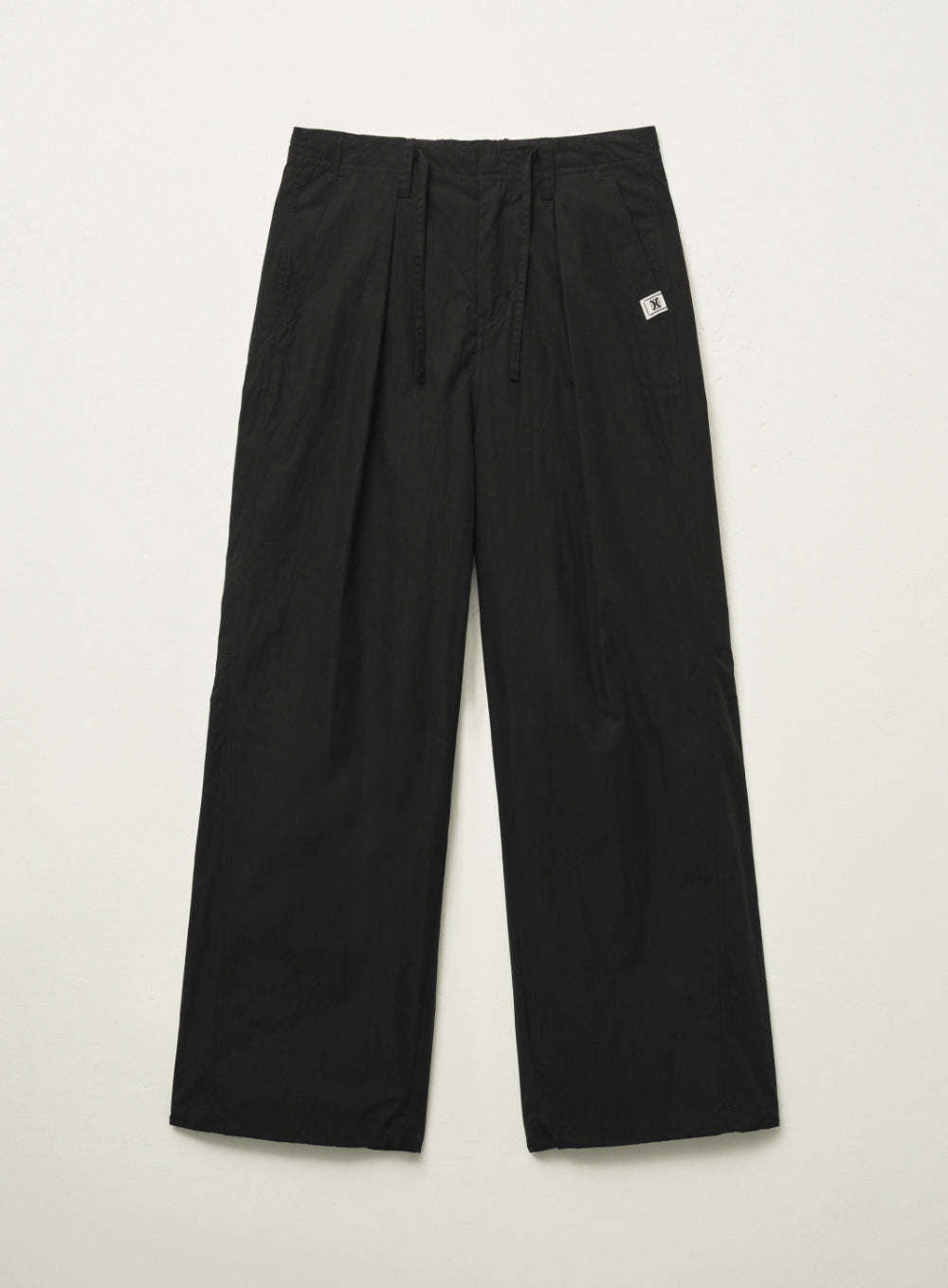 [satur] Curved Parachute Pants - Black