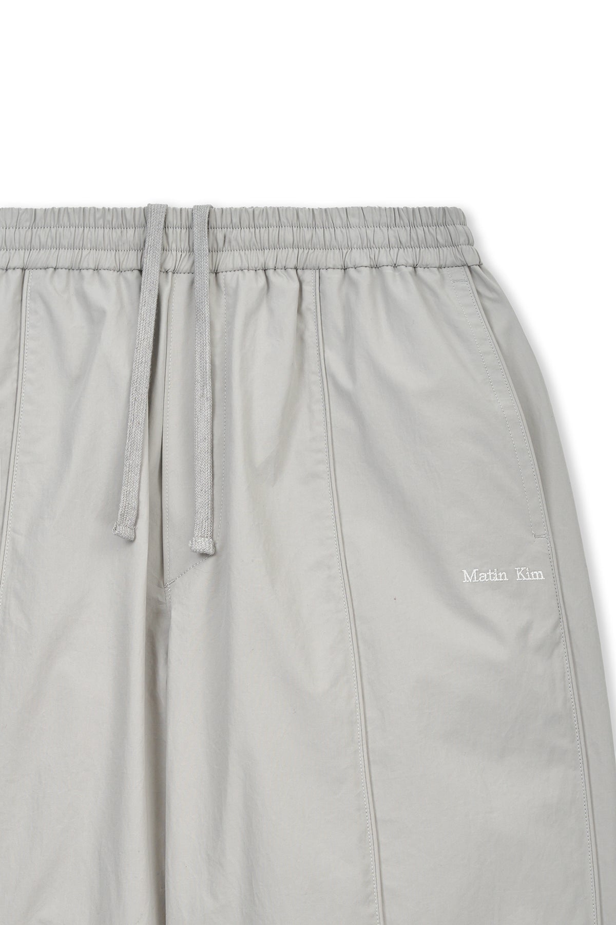 [matinkim] MULTI PANEL WIDE PANTS IN LIGHT GREY