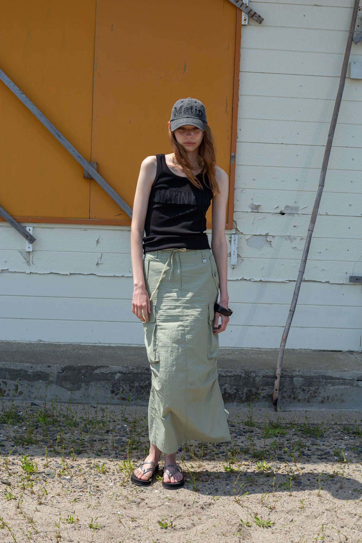 [matinkim] STRING NYLON CARGO SKIRT IN KHAKI