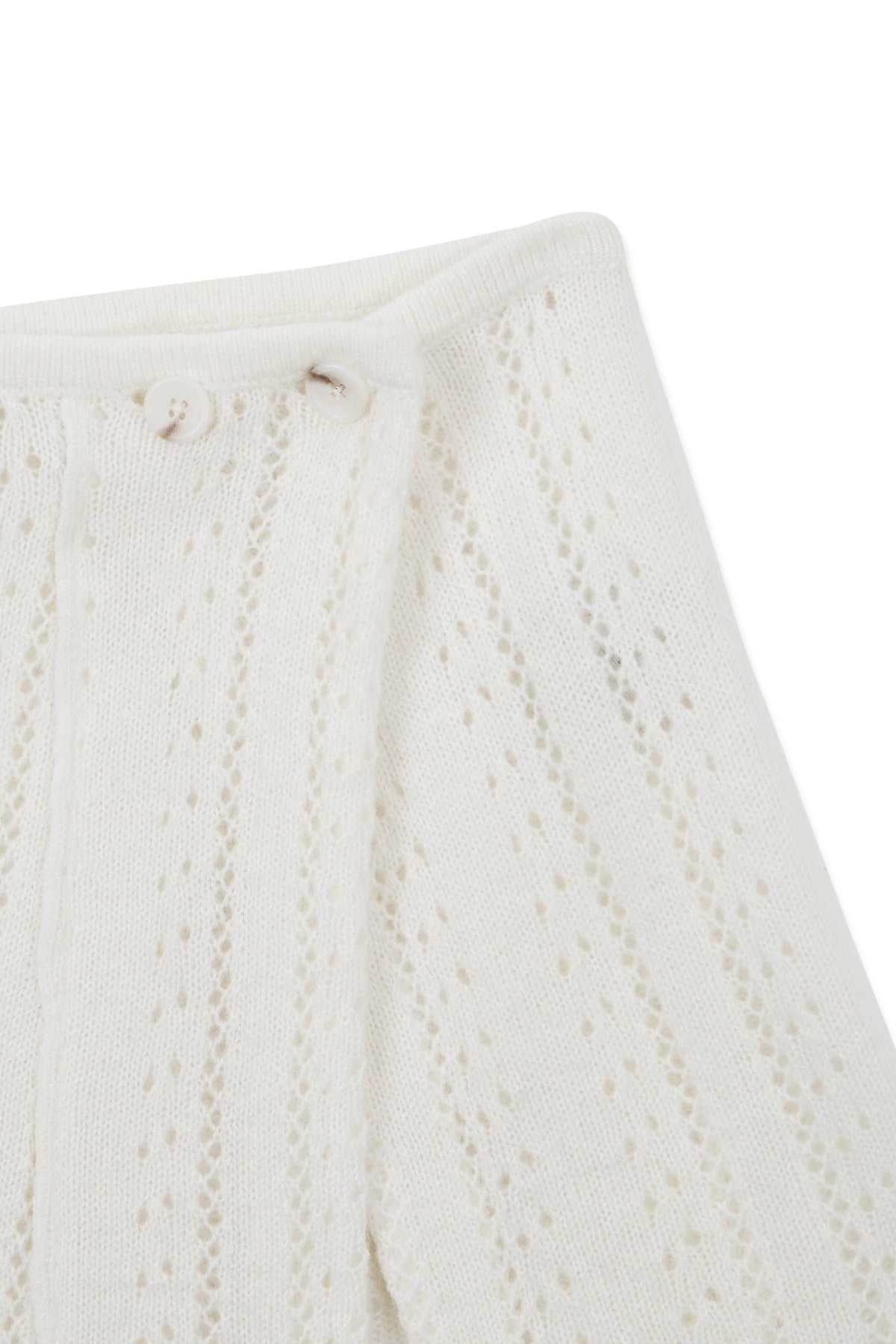 [matinkim] PUNCHING WRAP MINI SKIRT IN IVORY