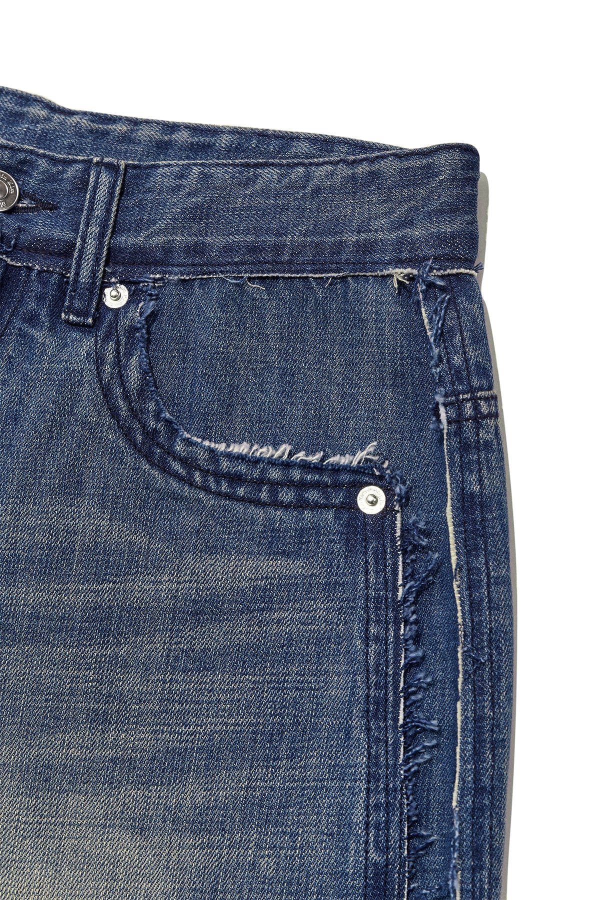 [matinkim] ROUGH CUT LINE POINT DENIM PANTS IN BLUE