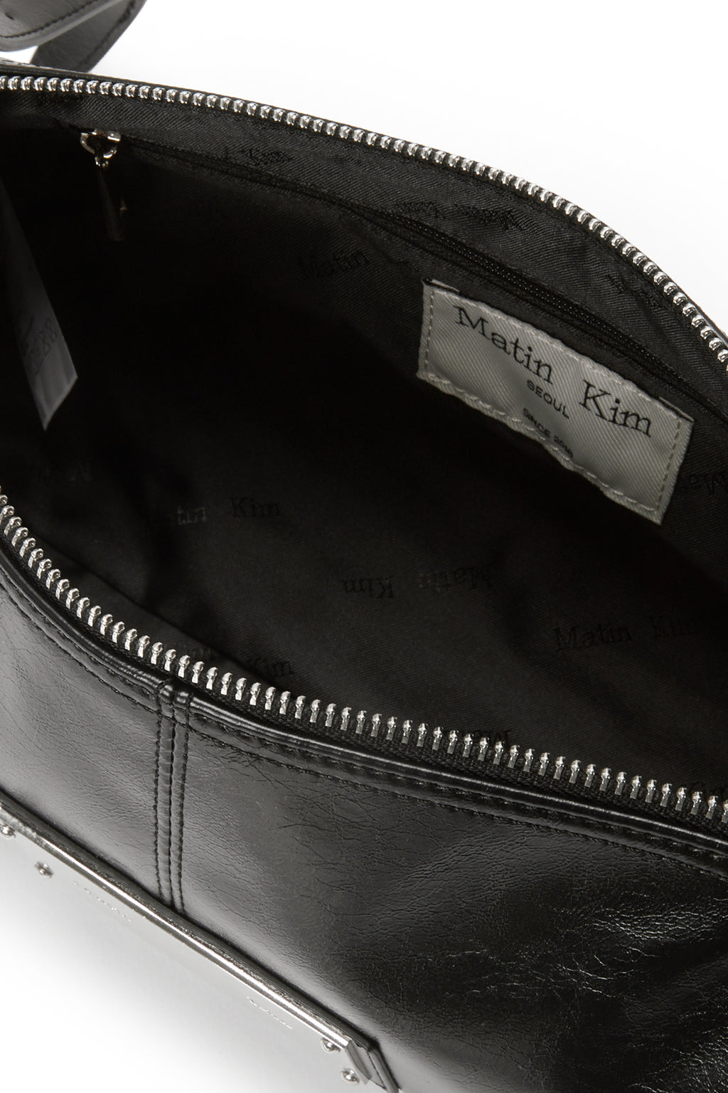 [matinkim] BUCKLE STRAP SHOULDER BAG IN BLACK