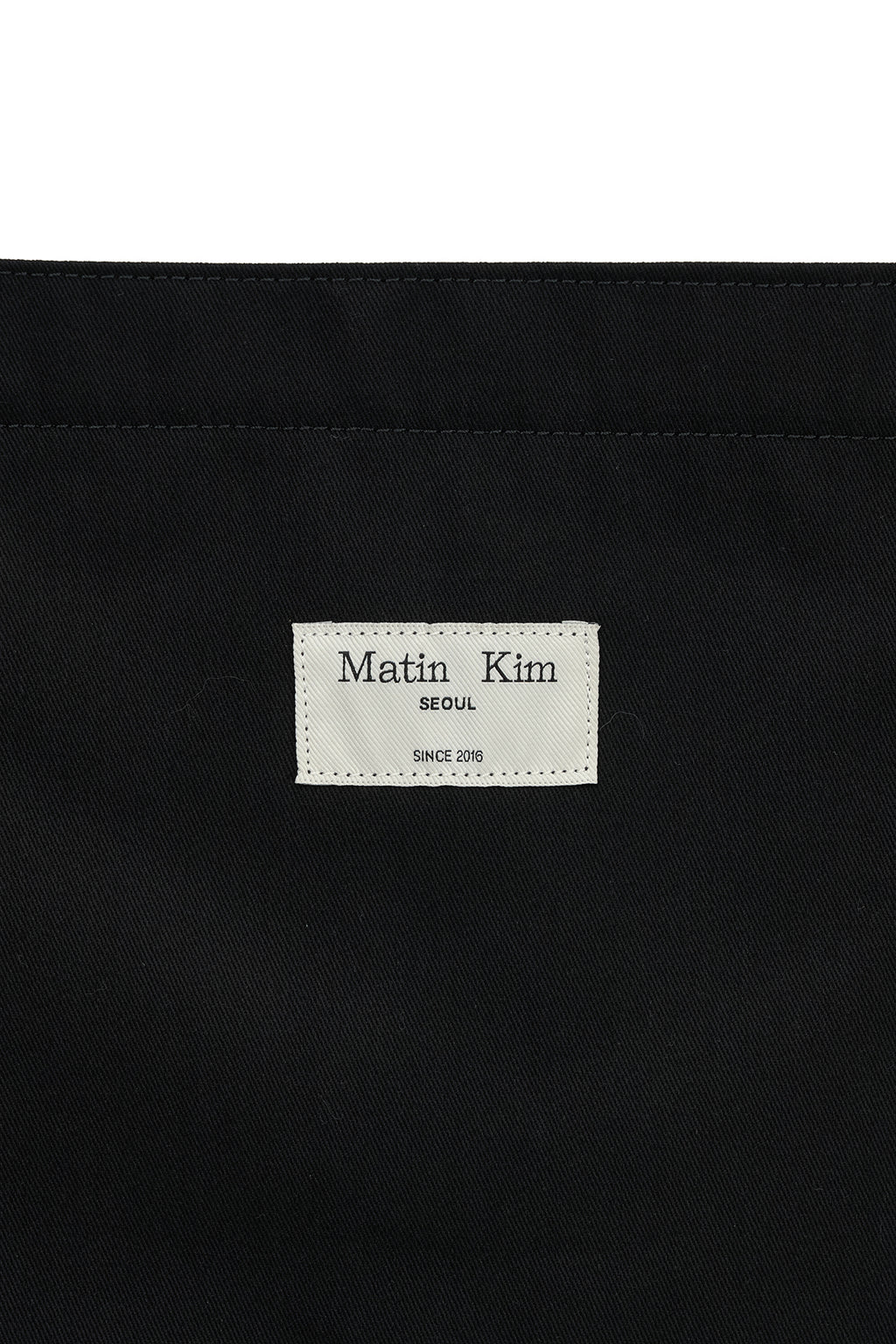 MATIN LNY 26 ECO BAG in Black by Matin Kim, a stylish and functional designer handbag.